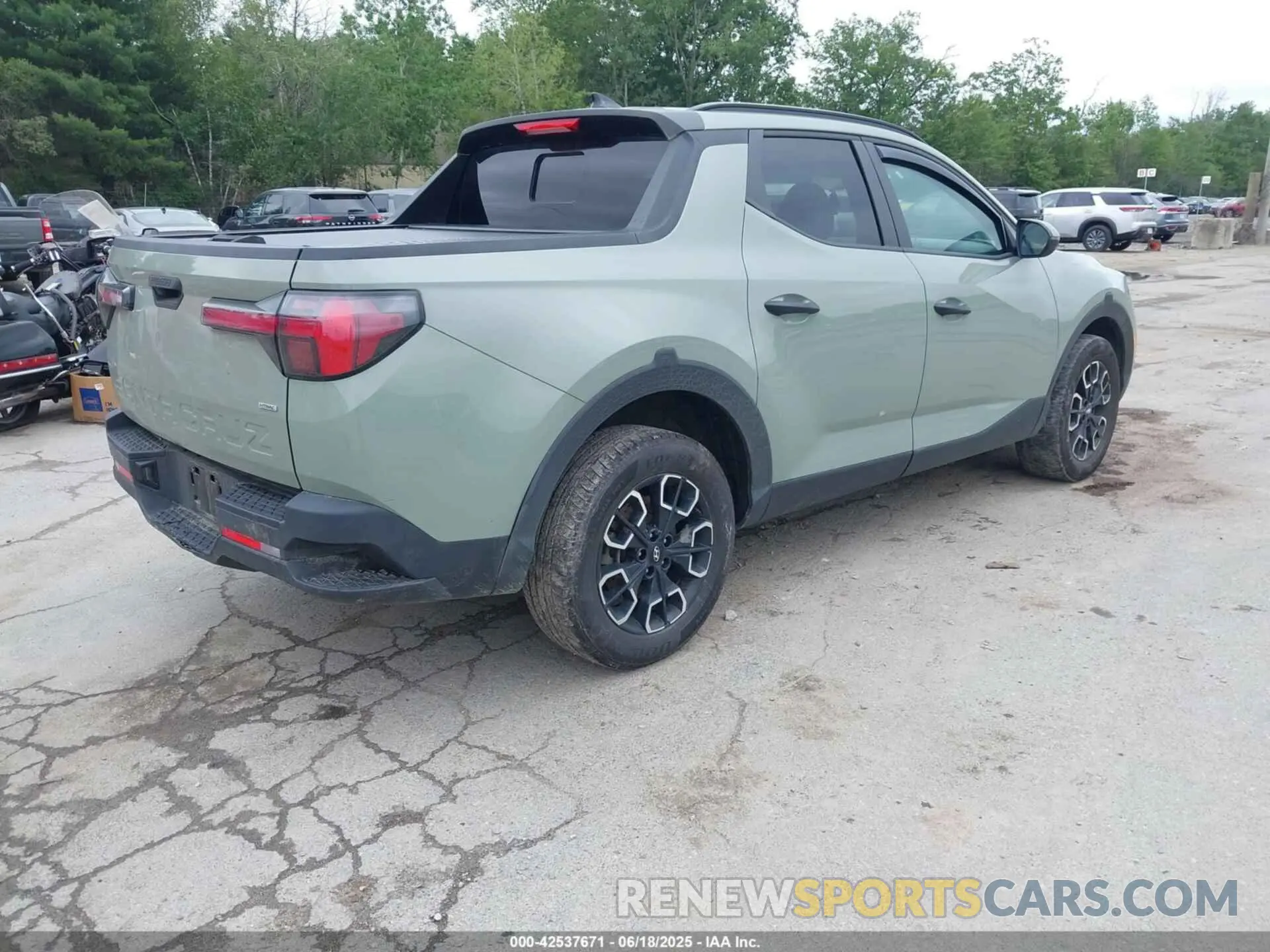 4 fotografías del automóvil dañado 5NTJCDAE3PH041492 HYUNDAI SANTA CRUZ 2023