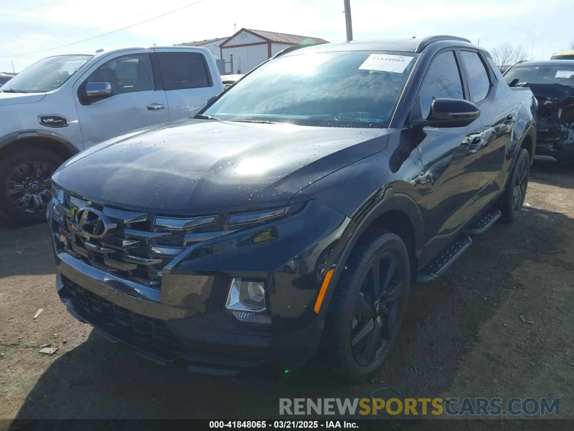 2 fotografías del automóvil dañado 5NTJCDAF2PH074217 HYUNDAI SANTA CRUZ 2023