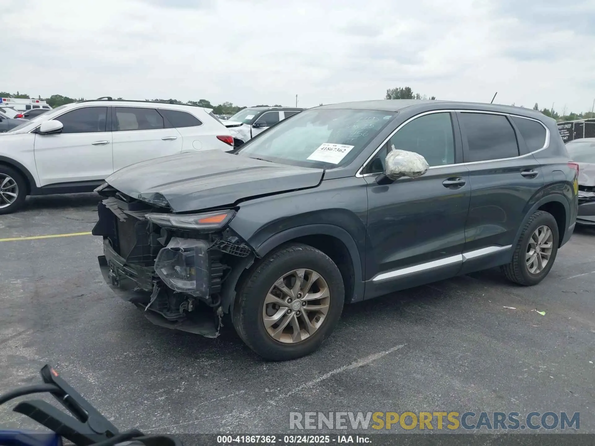 2 fotografías del automóvil dañado 5NMS23AD1KH067456 HYUNDAI SANTA FE 2019