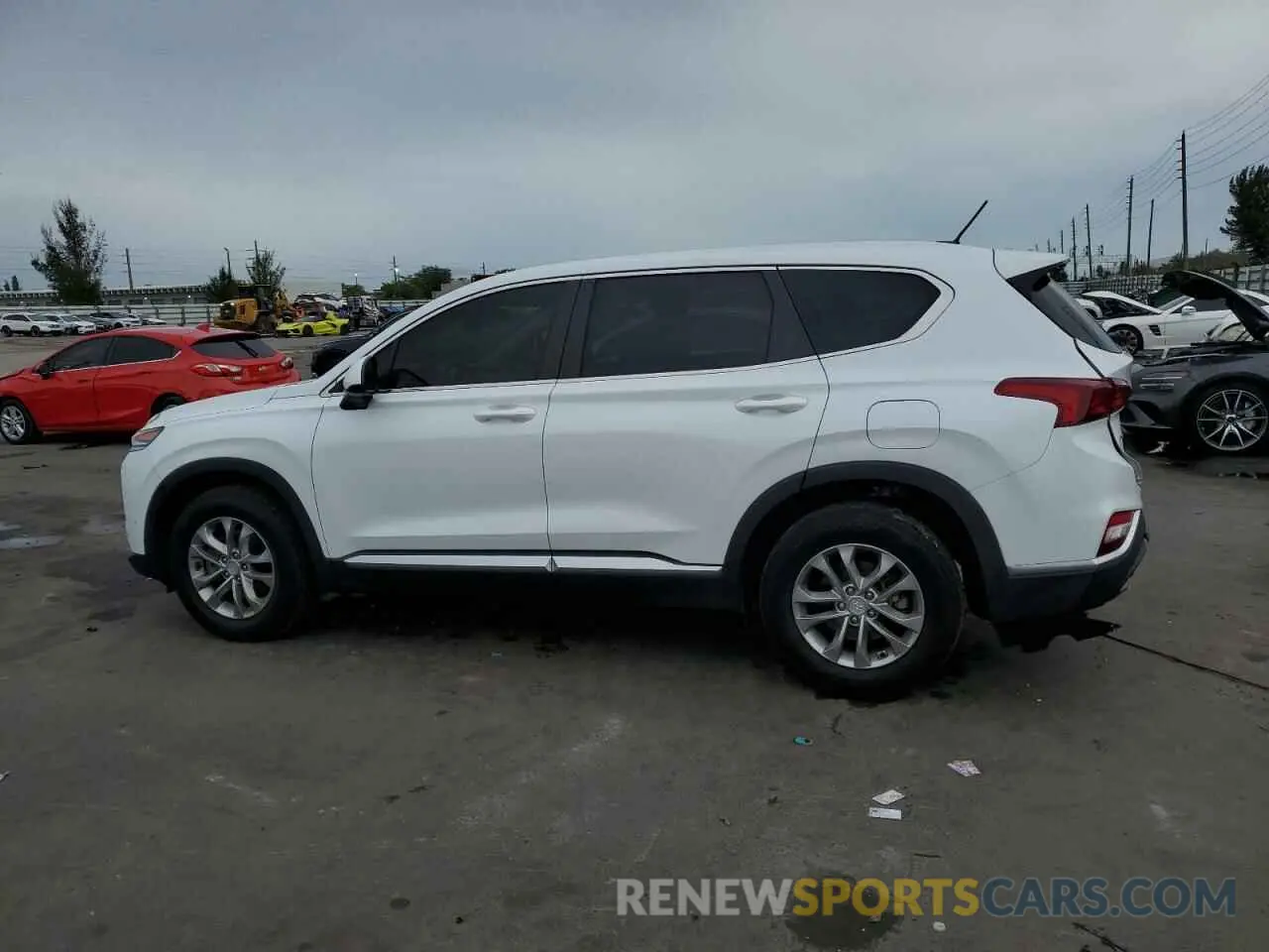 2 fotografías del automóvil dañado 5NMS23AD9KH039159 HYUNDAI SANTA FE 2019