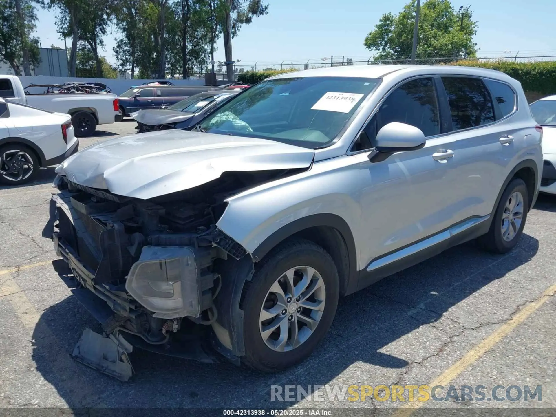 2 fotografías del automóvil dañado 5NMS23ADXKH000872 HYUNDAI SANTA FE 2019