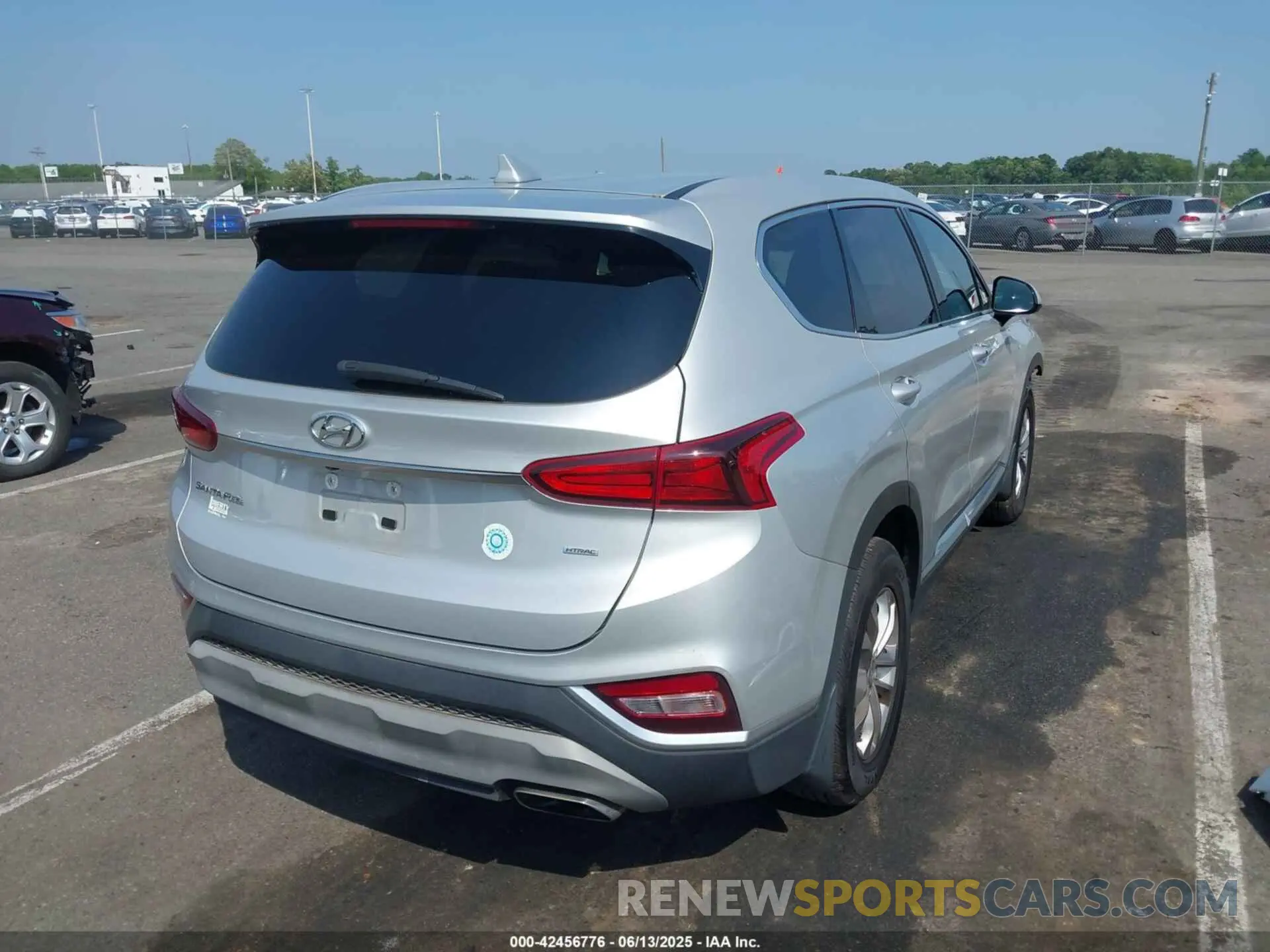 4 fotografías del automóvil dañado 5NMS3CAD4KH095474 HYUNDAI SANTA FE 2019