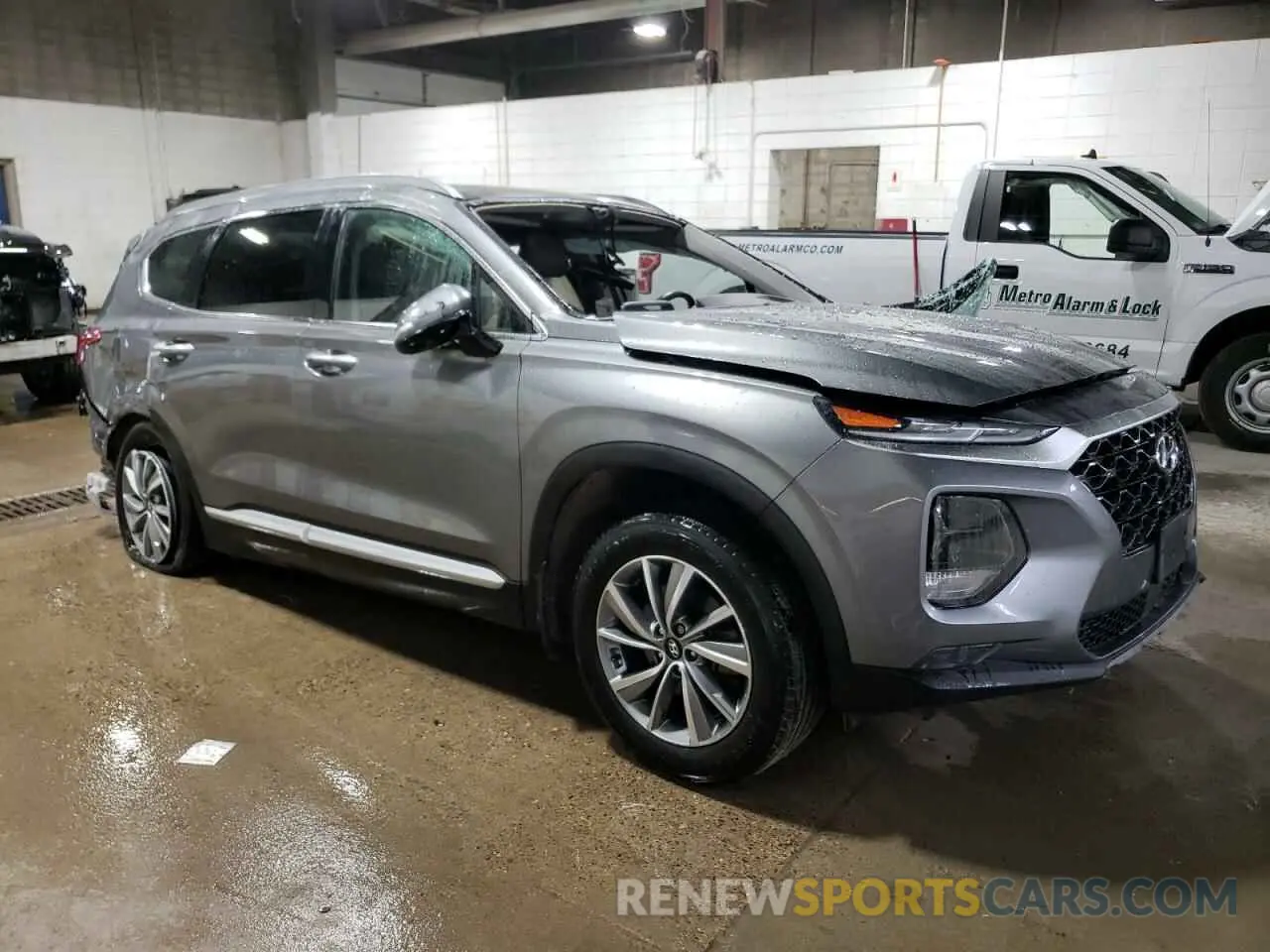4 fotografías del automóvil dañado 5NMS5CAD2KH135223 HYUNDAI SANTA FE 2019