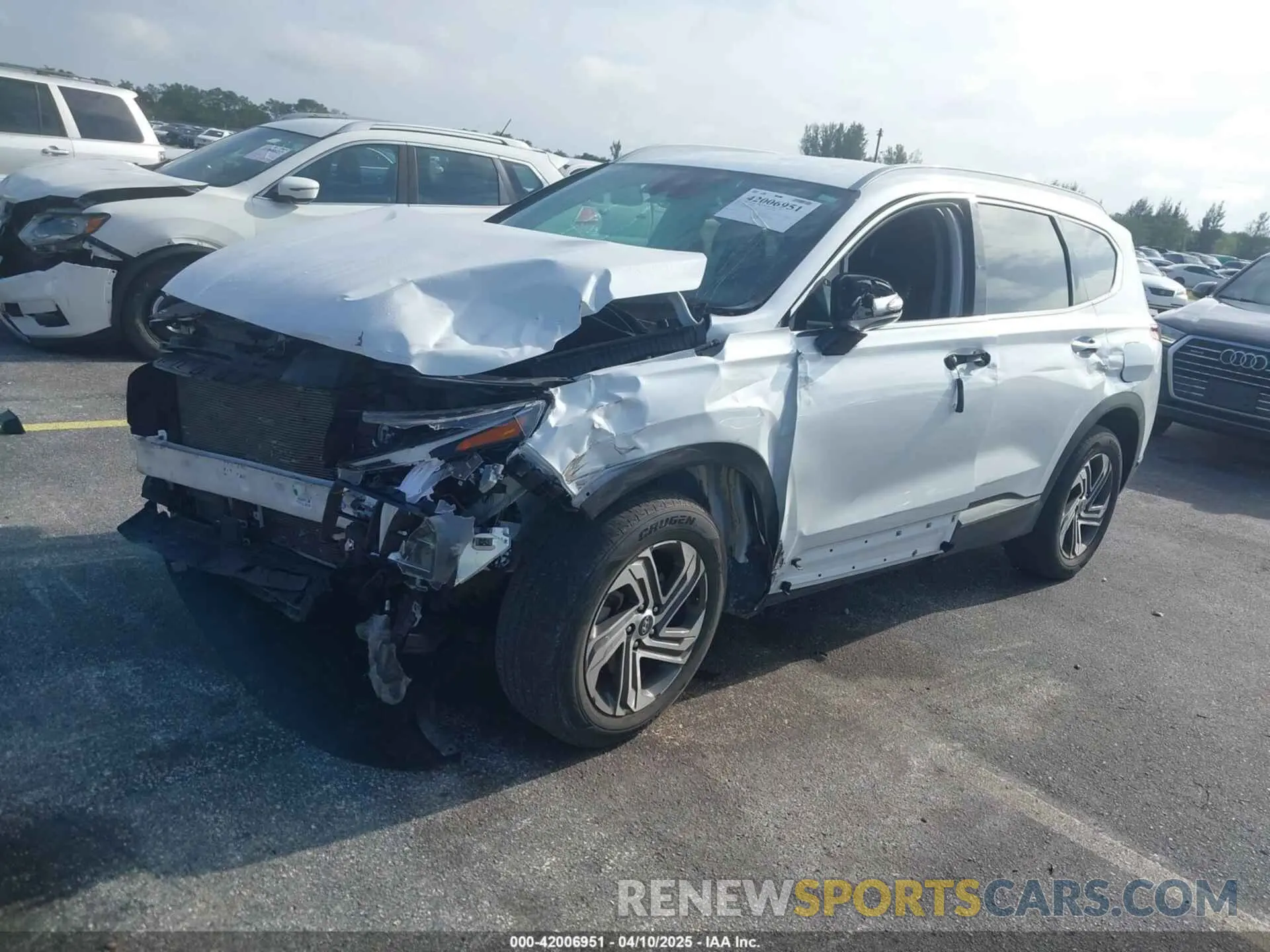 2 fotografías del automóvil dañado 5NMS24AJ5PH489328 HYUNDAI SANTA FE 2023