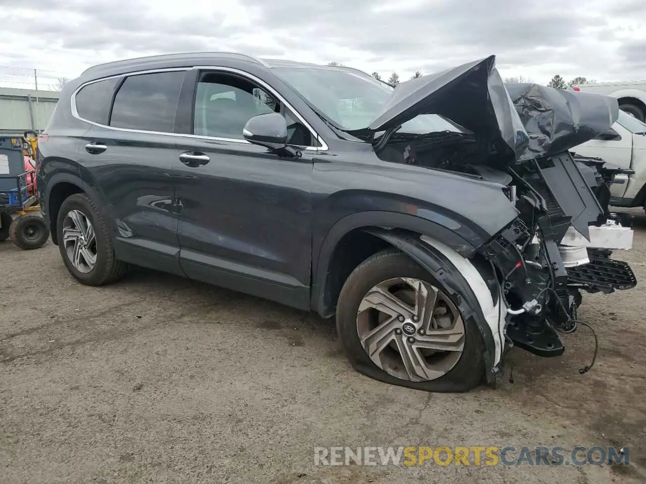 4 fotografías del automóvil dañado 5NMS2DAJ0PH644898 HYUNDAI SANTA FE 2023