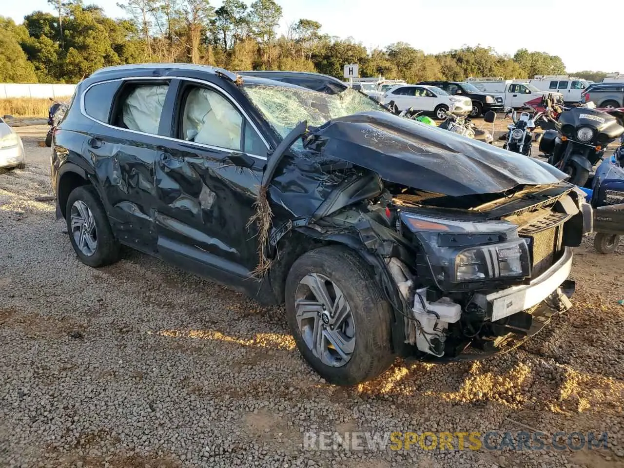 4 fotografías del automóvil dañado 5NMS2DAJ1PH541246 HYUNDAI SANTA FE 2023