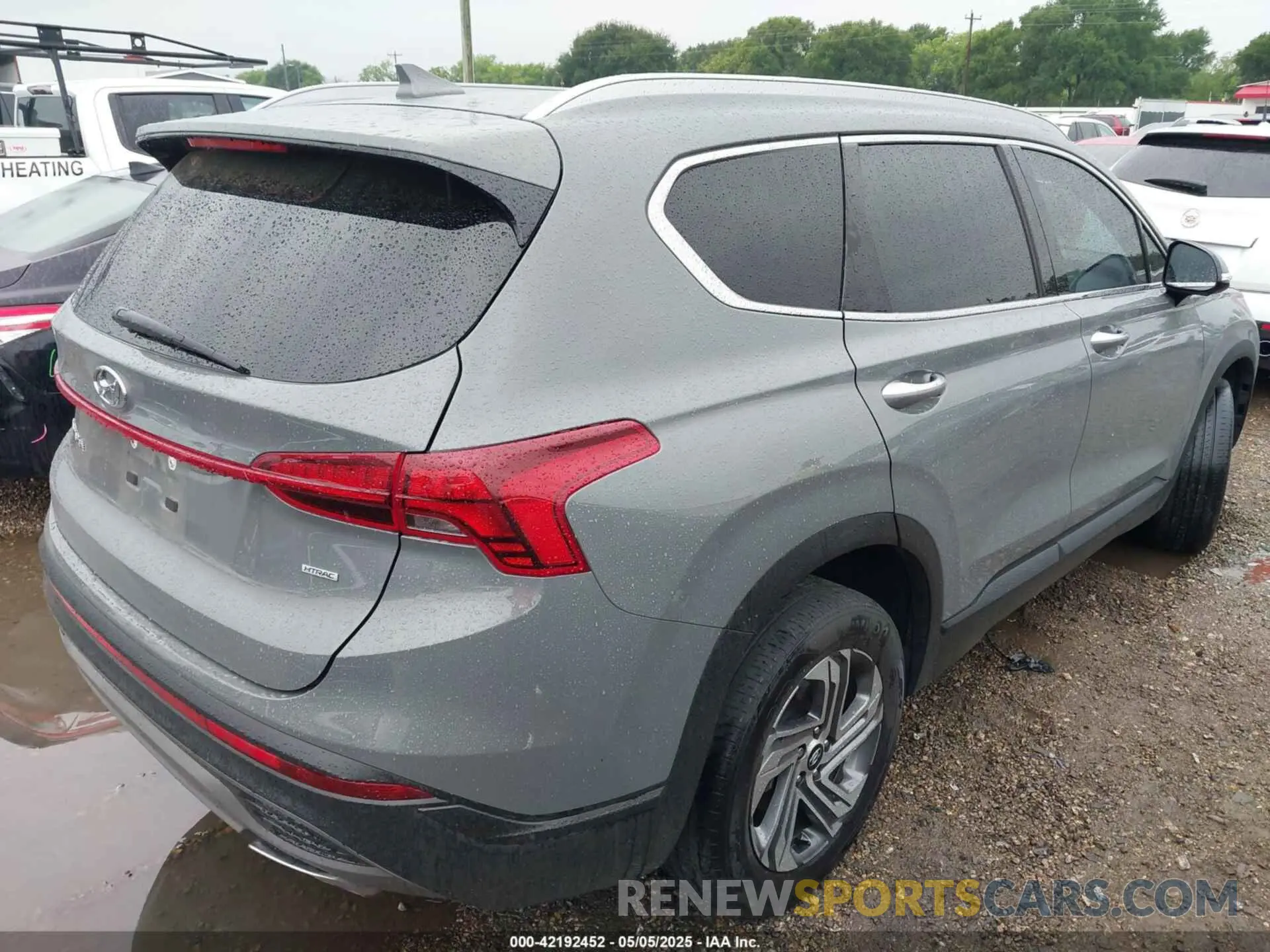 4 fotografías del automóvil dañado 5NMS2DAJ7PH584506 HYUNDAI SANTA FE 2023