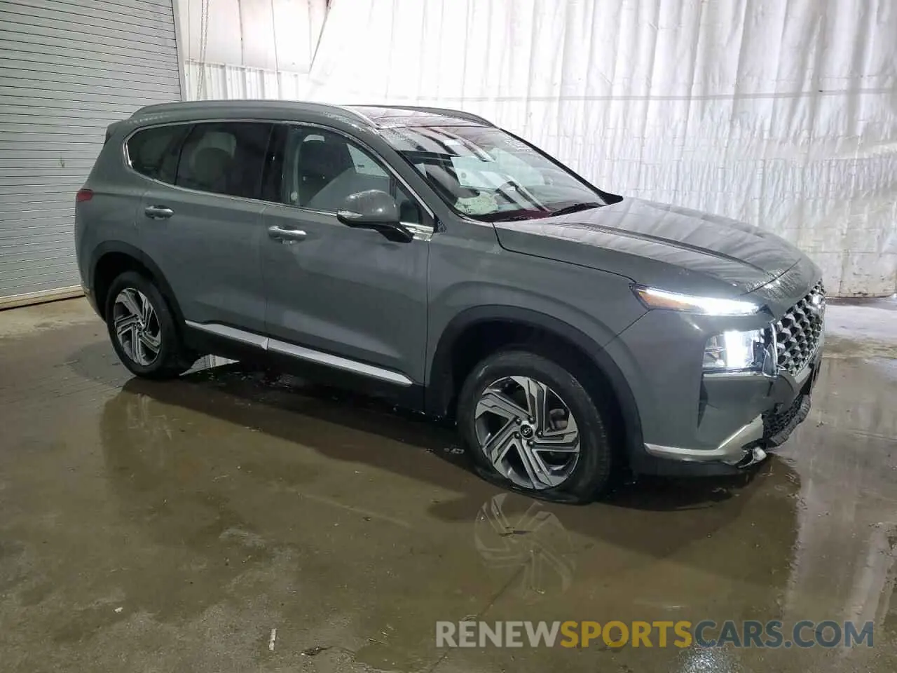 4 fotografías del automóvil dañado 5NMS3DAJ6PH630047 HYUNDAI SANTA FE 2023