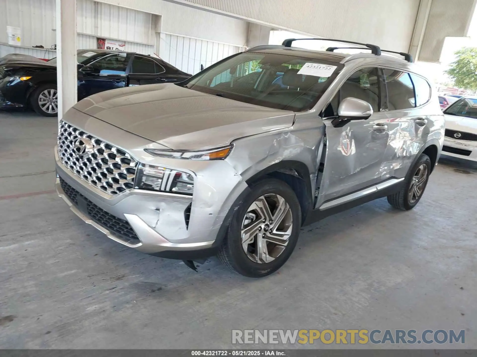 2 fotografías del automóvil dañado 5NMS3DAJ7PH536100 HYUNDAI SANTA FE 2023