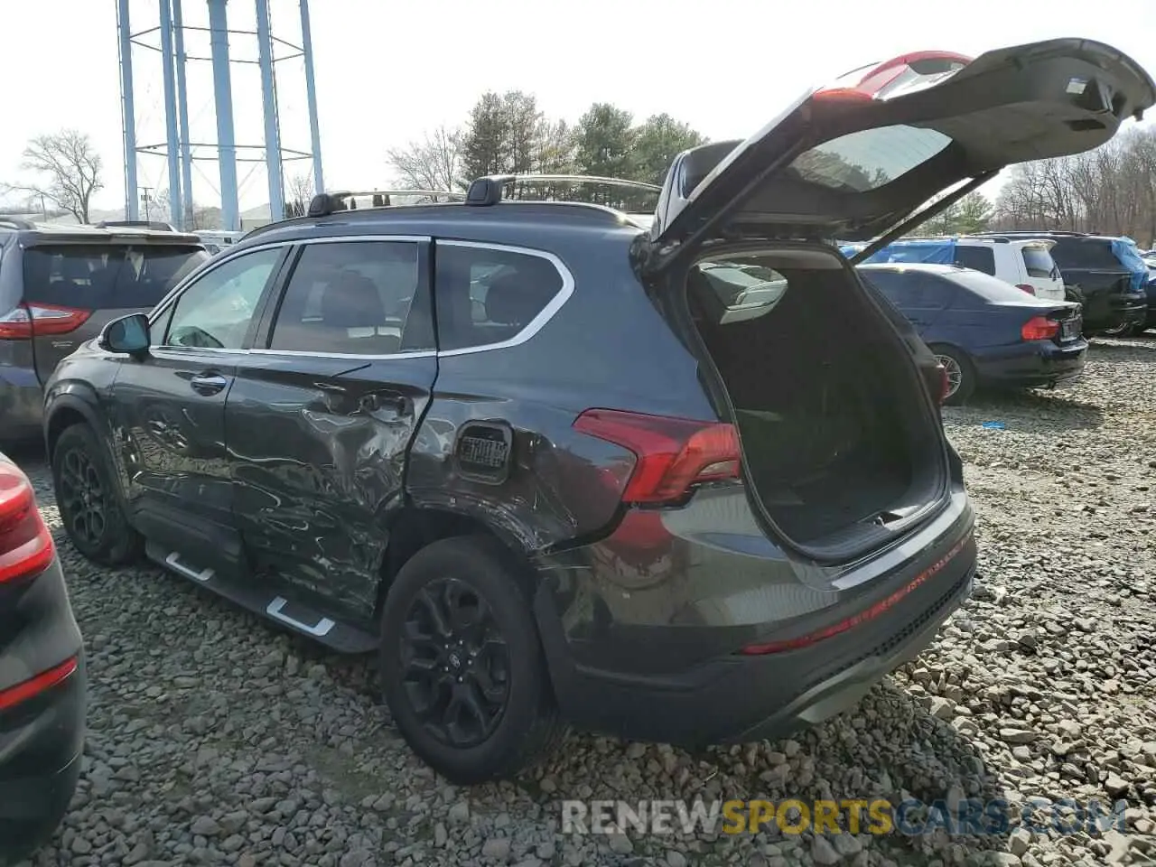 2 fotografías del automóvil dañado 5NMS6DAJ7PH616861 HYUNDAI SANTA FE 2023