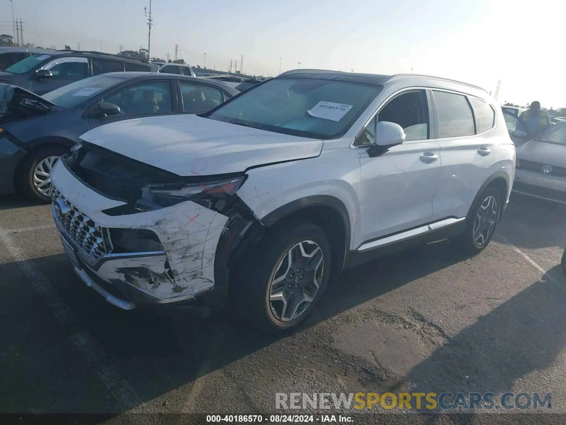 2 fotografías del automóvil dañado 5NMS5DA10PH002995 HYUNDAI SANTA FE HYBRID 2023