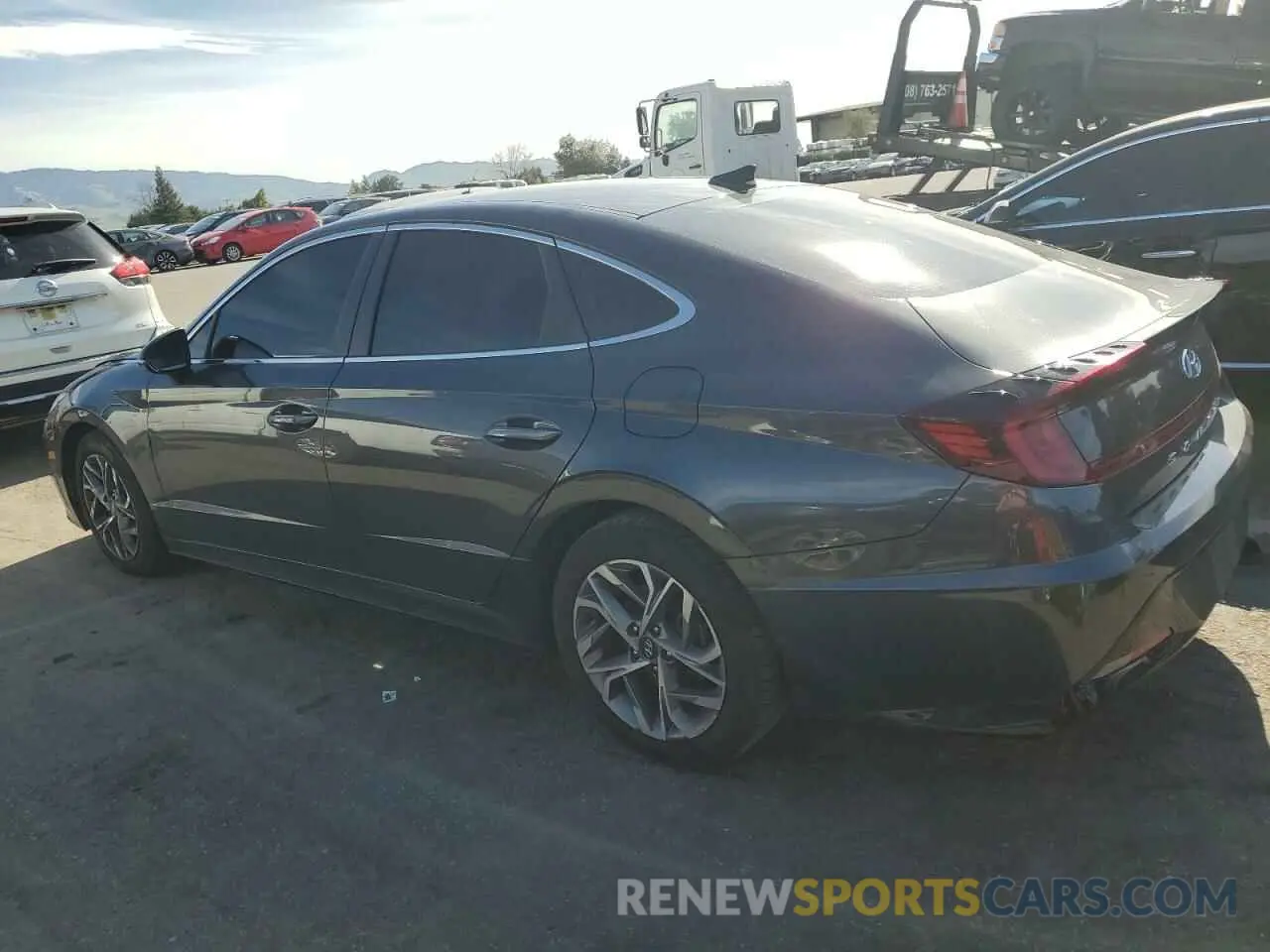 2 fotografías del automóvil dañado 5NPEL4JA2LH013867 HYUNDAI SONATA 2020