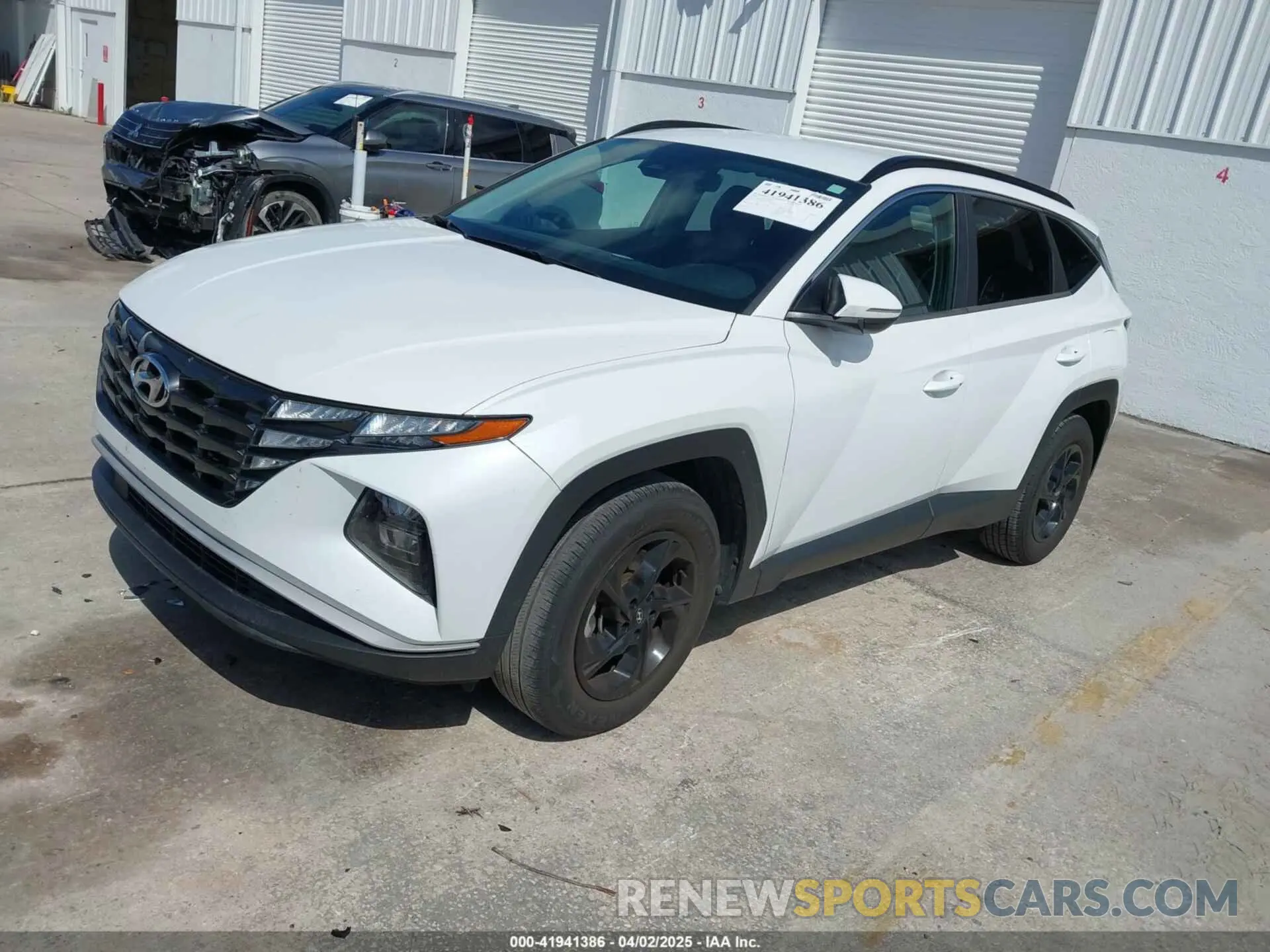2 fotografías del automóvil dañado 5NMJB3AE1NH027676 HYUNDAI TUCSON 2022