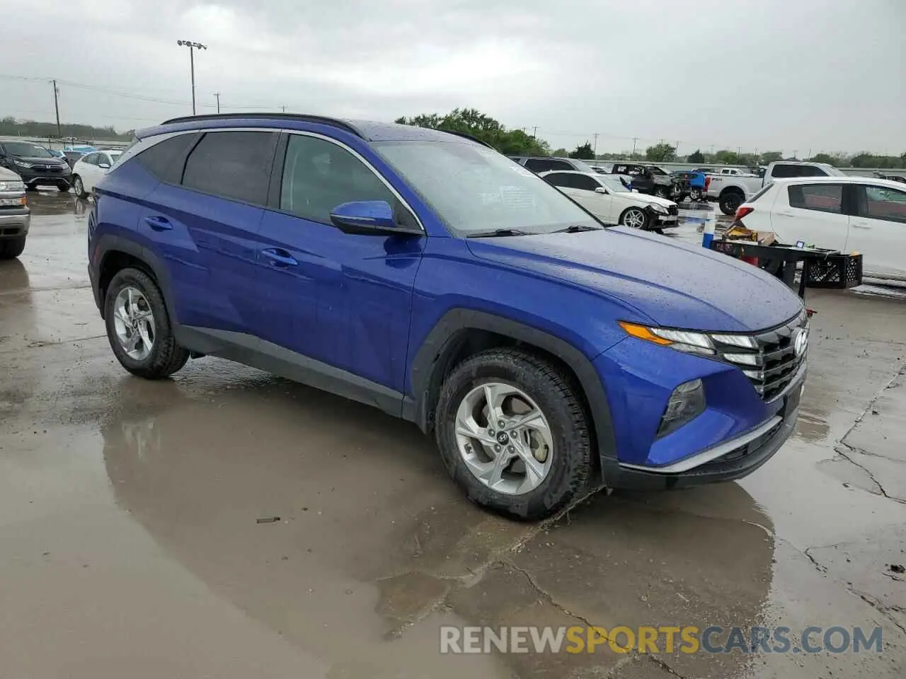 4 fotografías del automóvil dañado 5NMJBCAE0NH118339 HYUNDAI TUCSON 2022