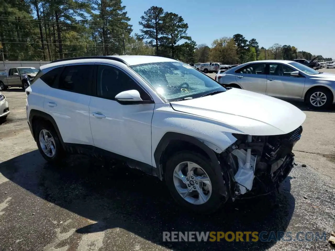 4 fotografías del automóvil dañado 5NMJBCAE1NH121458 HYUNDAI TUCSON 2022