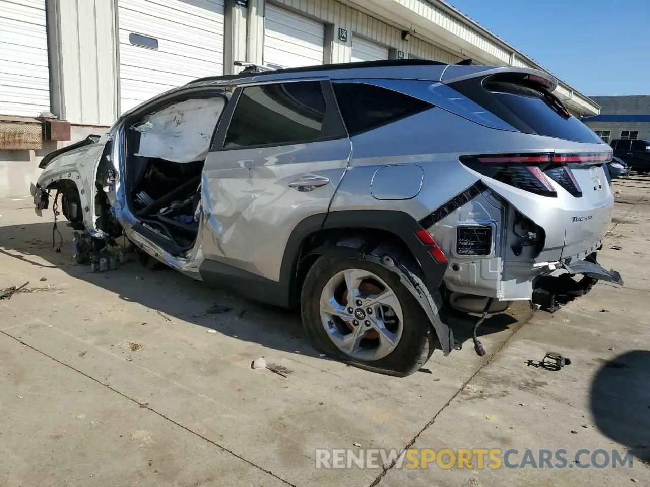 2 fotografías del automóvil dañado 5NMJBCAE1NH159272 HYUNDAI TUCSON 2022