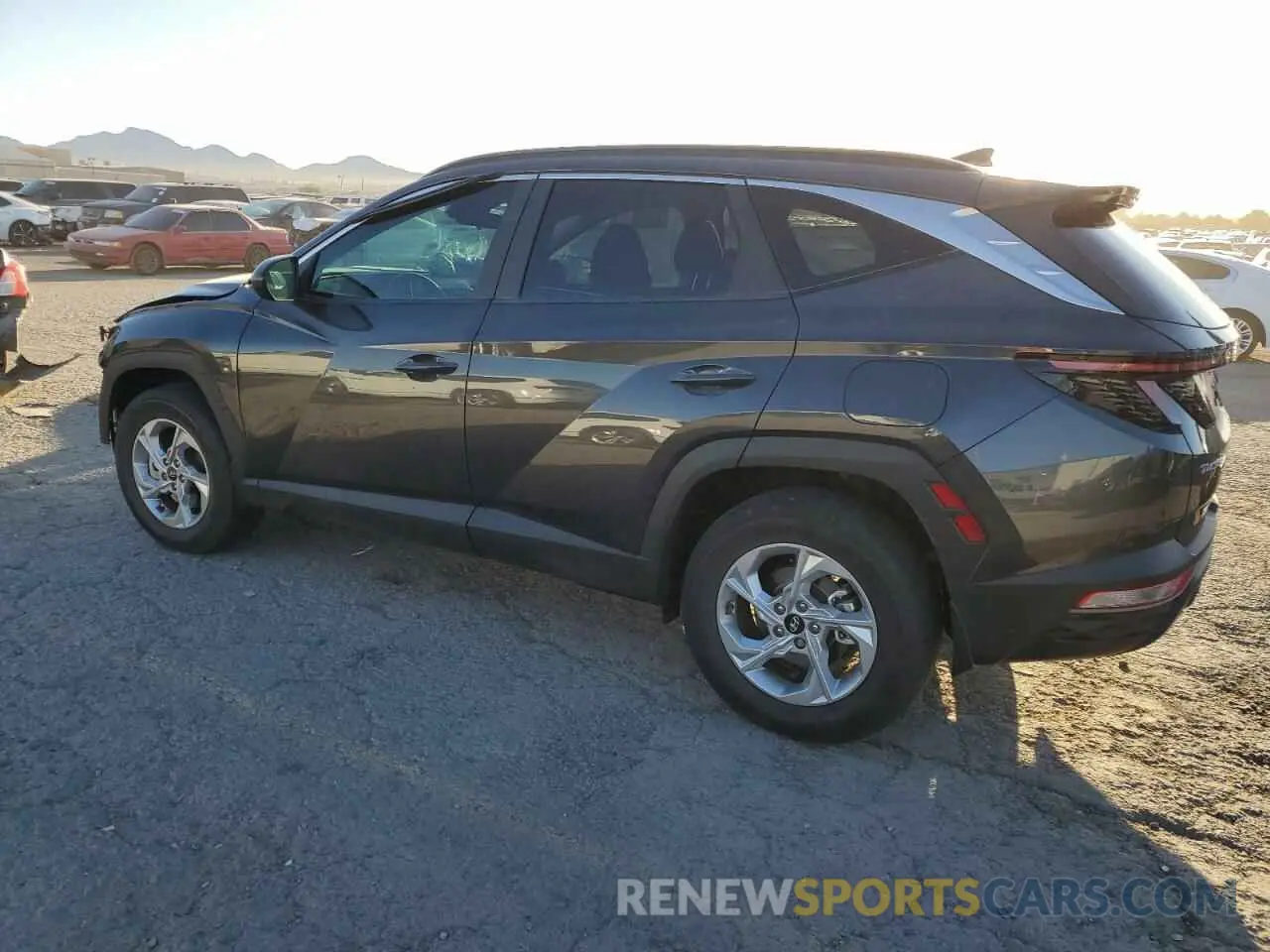 2 fotografías del automóvil dañado 5NMJBCAE5NH073544 HYUNDAI TUCSON 2022