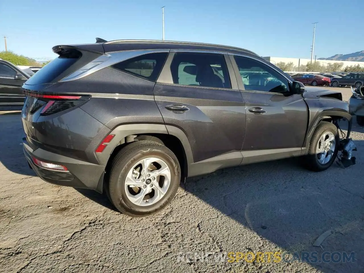3 fotografías del automóvil dañado 5NMJBCAE5NH073544 HYUNDAI TUCSON 2022