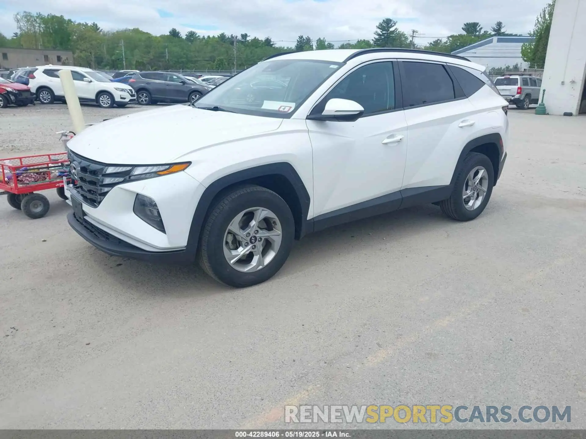 2 fotografías del automóvil dañado 5NMJBCAE8NH123949 HYUNDAI TUCSON 2022