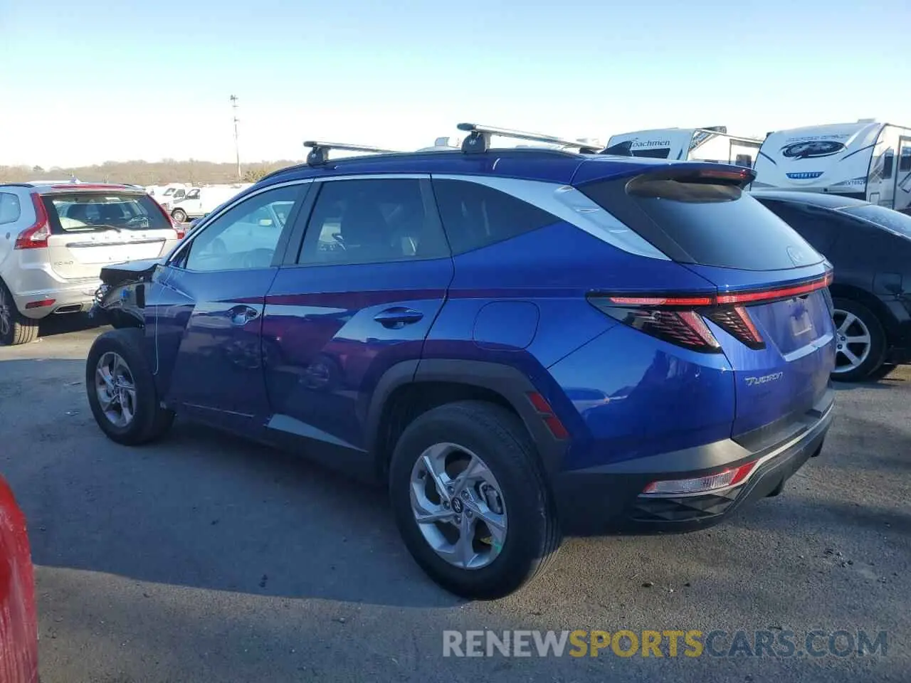 2 fotografías del automóvil dañado 5NMJBCAE9NH086216 HYUNDAI TUCSON 2022