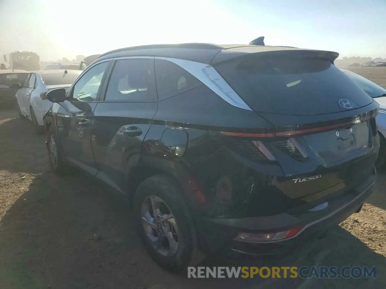 2 fotografías del automóvil dañado 5NMJBCAE9NH137827 HYUNDAI TUCSON 2022