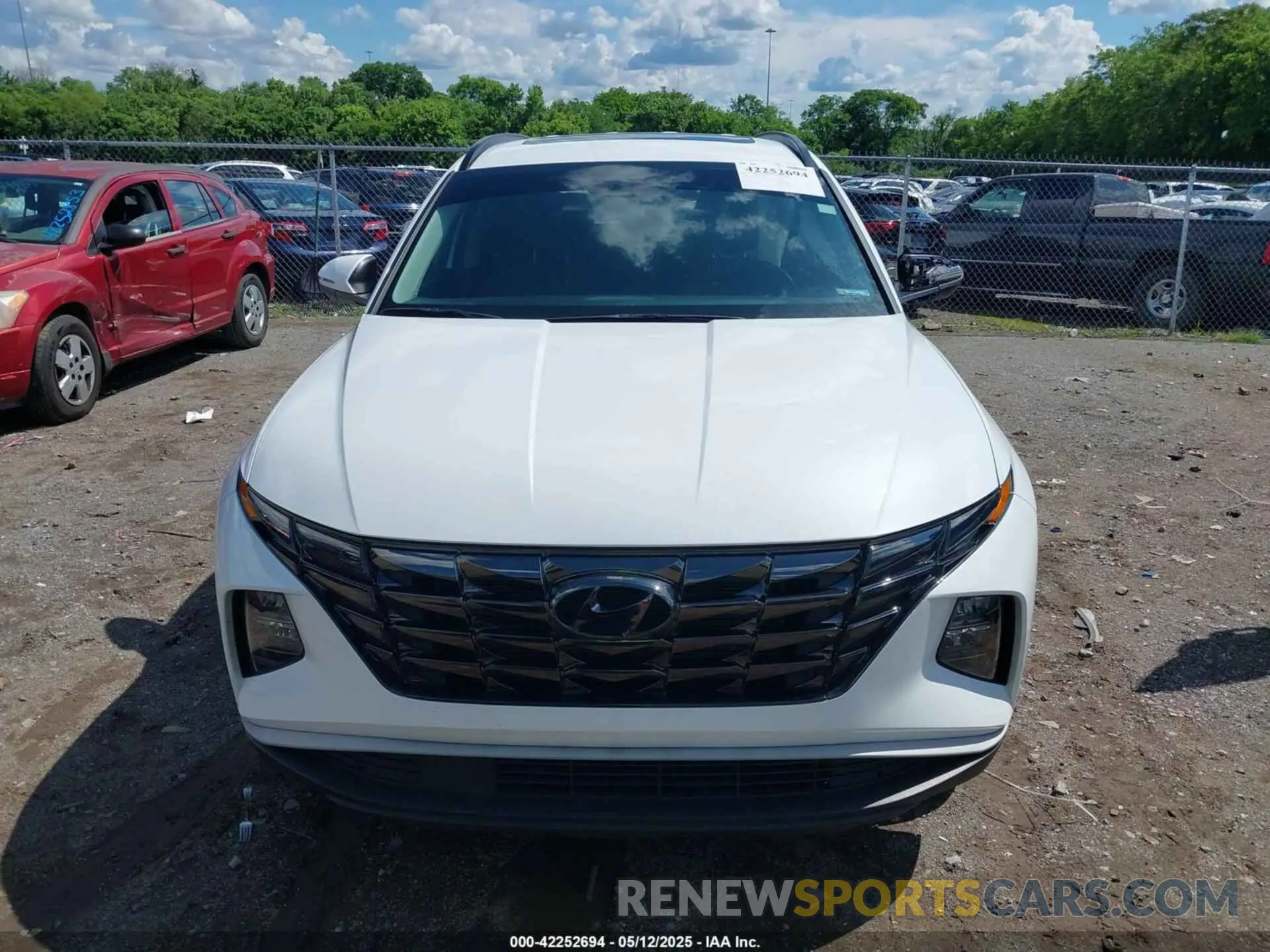 12 fotografías del automóvil dañado 5NMJC3AE7NH057679 HYUNDAI TUCSON 2022