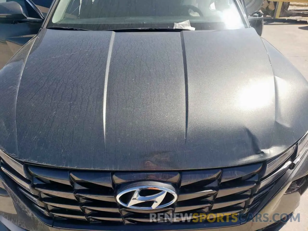 13 fotografías del automóvil dañado 5NMJF3AE1NH050993 HYUNDAI TUCSON 2022