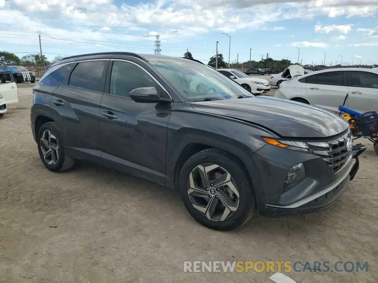 4 fotografías del automóvil dañado 5NMJF3AE4NH029412 HYUNDAI TUCSON 2022