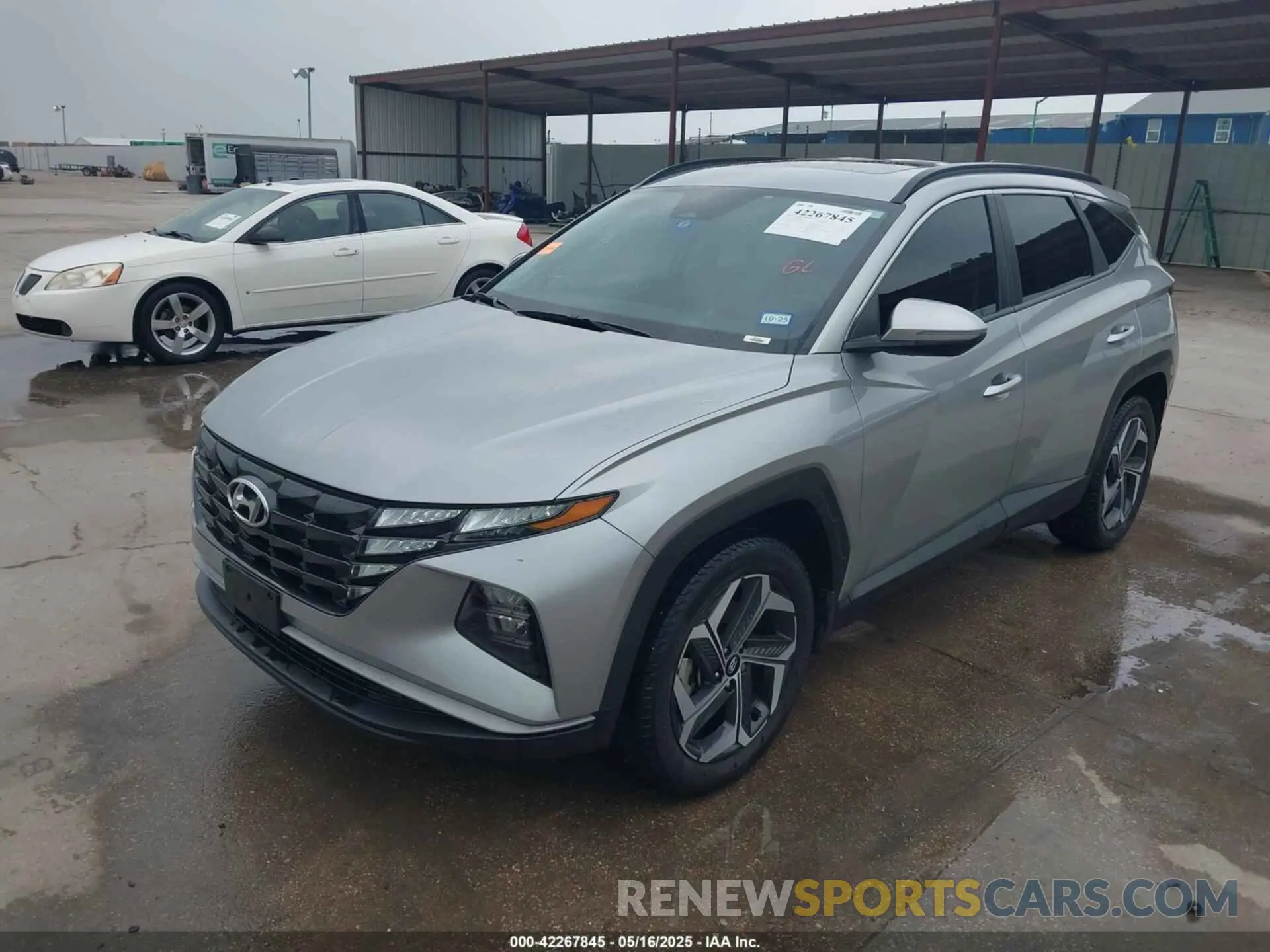 2 fotografías del automóvil dañado 5NMJFCAE1NH153444 HYUNDAI TUCSON 2022