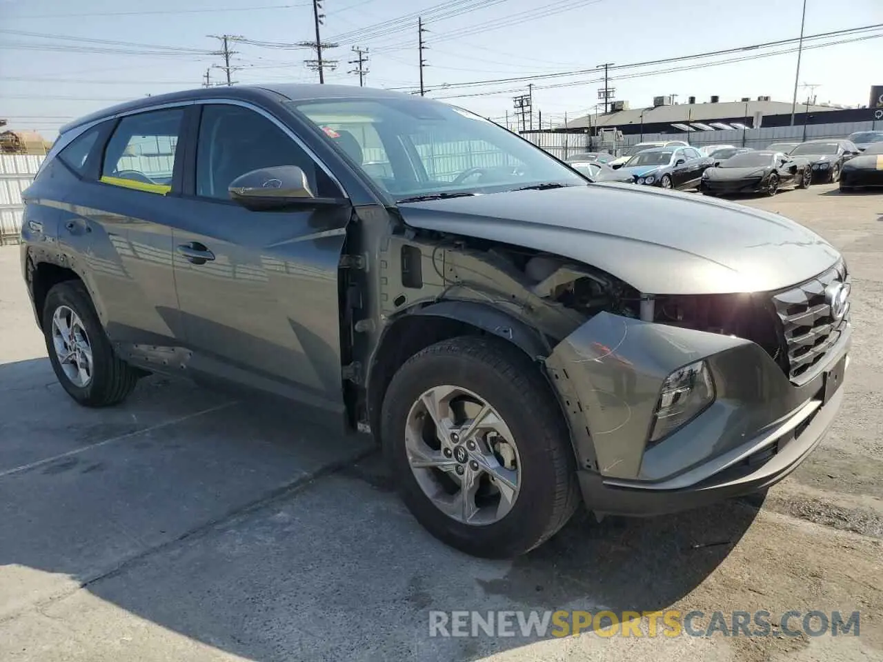 4 fotografías del automóvil dañado 5NMJACAE4PH280531 HYUNDAI TUCSON 2023