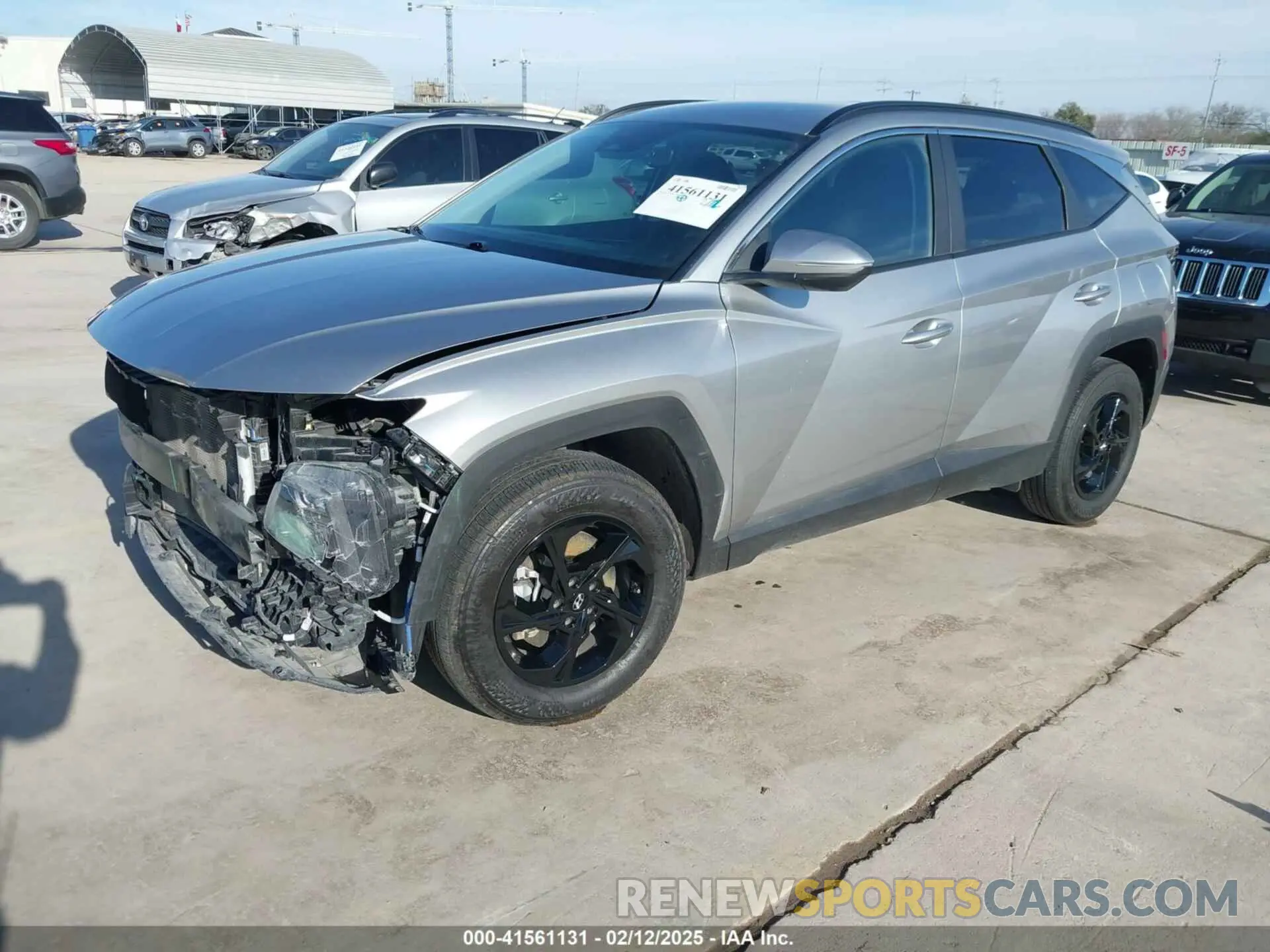 2 fotografías del automóvil dañado 5NMJBCAE2PH266771 HYUNDAI TUCSON 2023
