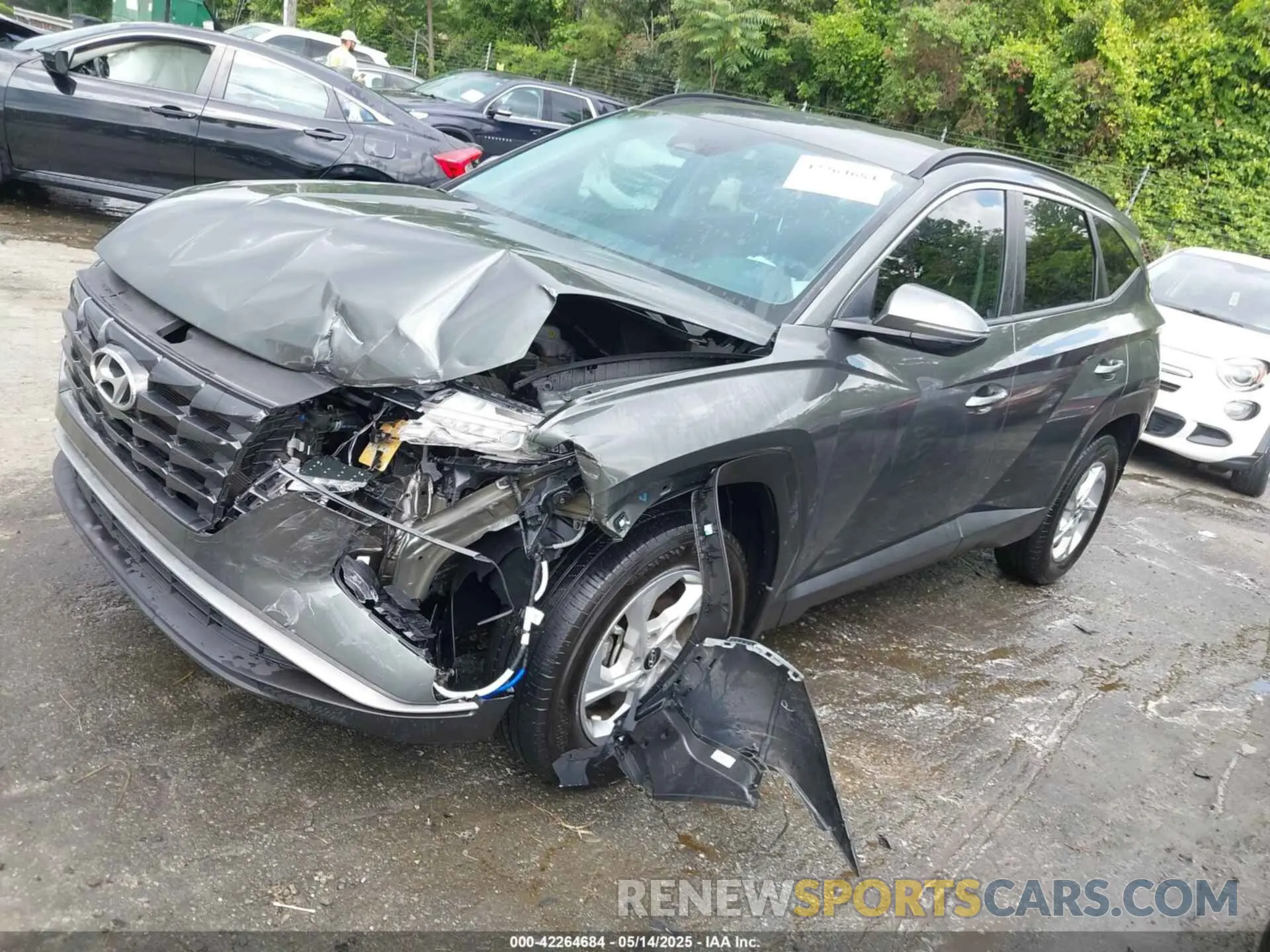 2 fotografías del automóvil dañado 5NMJBCAE4PH238244 HYUNDAI TUCSON 2023