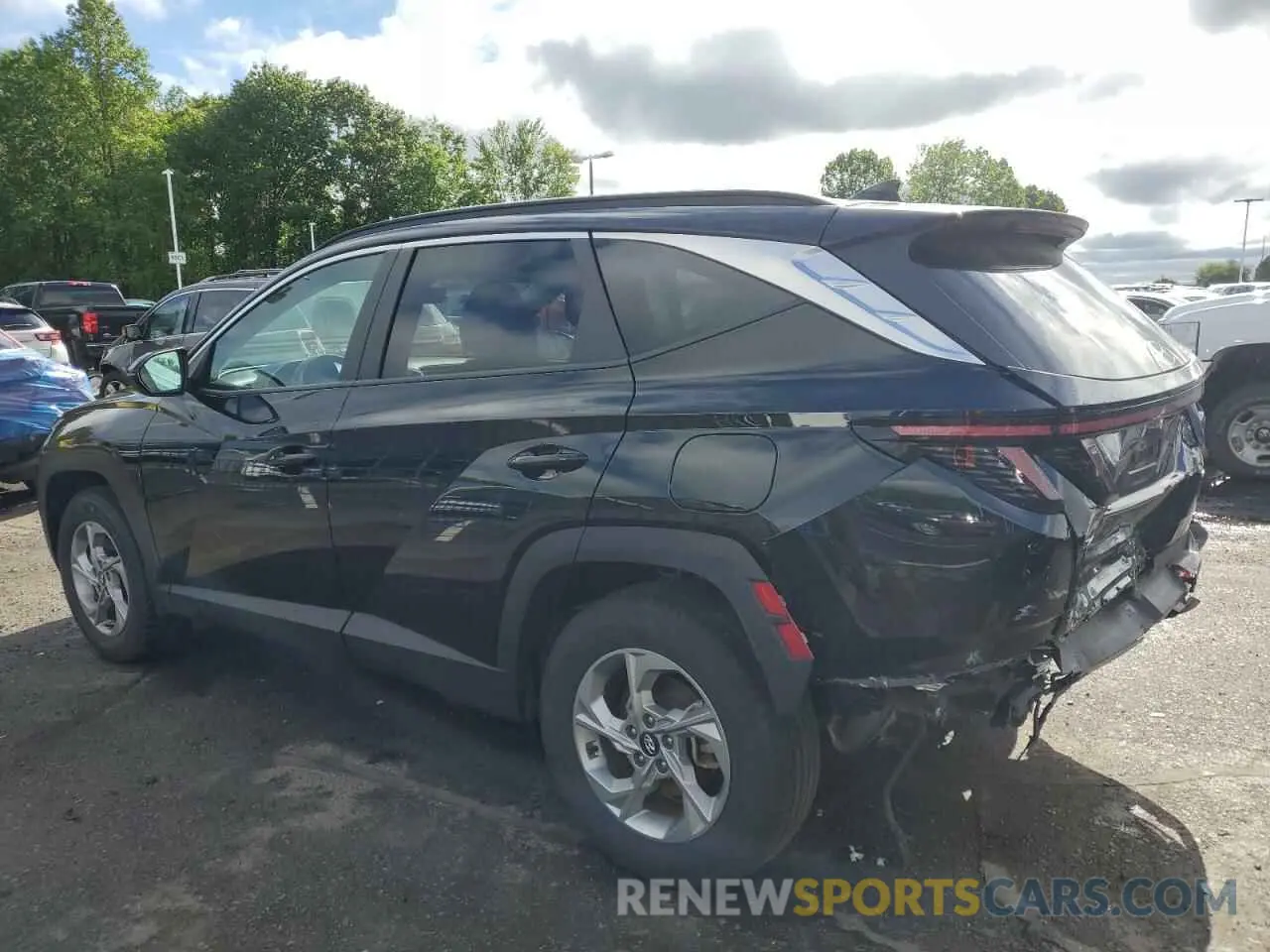 2 fotografías del automóvil dañado 5NMJBCAE5PH232002 HYUNDAI TUCSON 2023