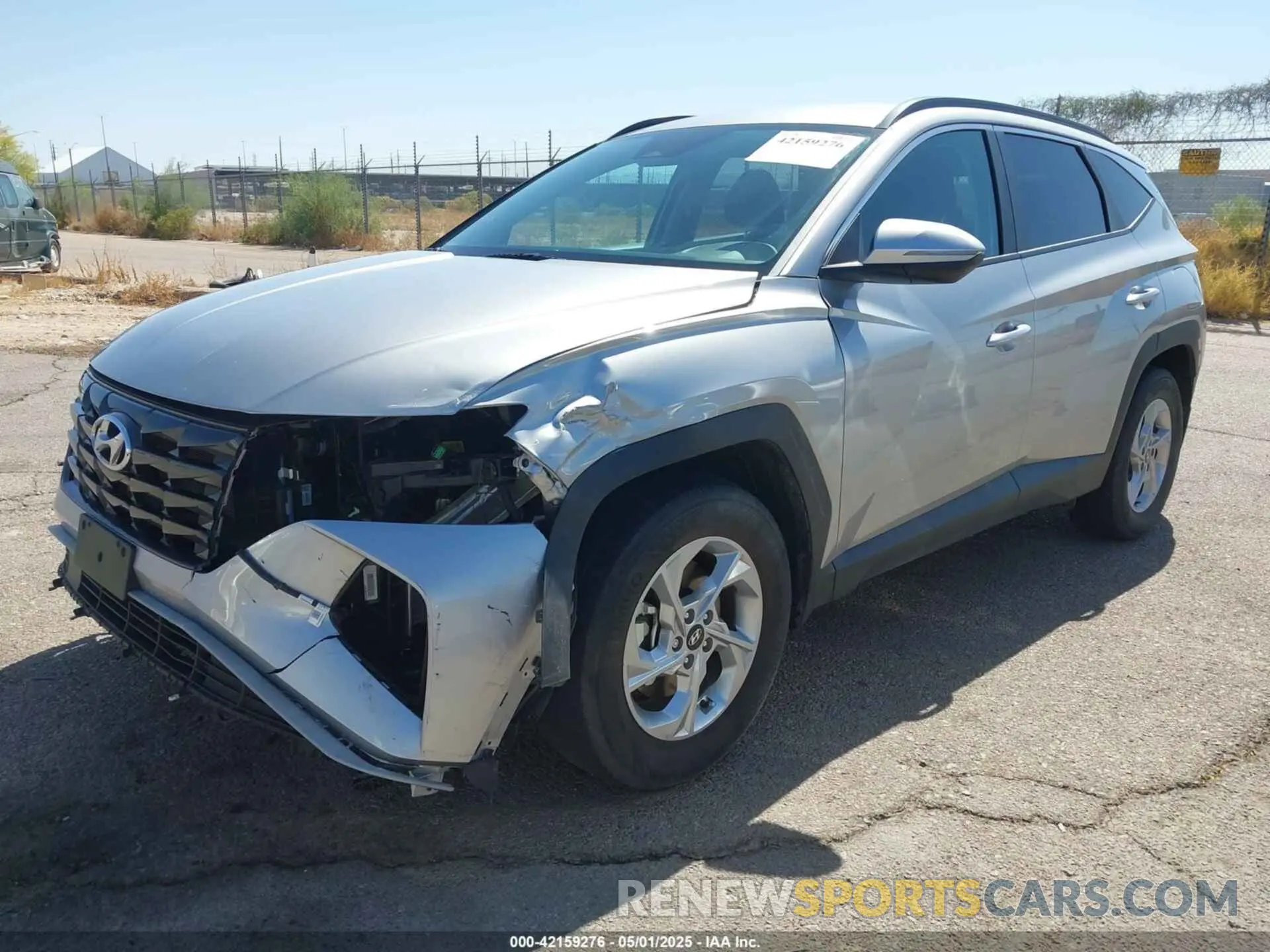 2 fotografías del automóvil dañado 5NMJBCAE7PH239761 HYUNDAI TUCSON 2023