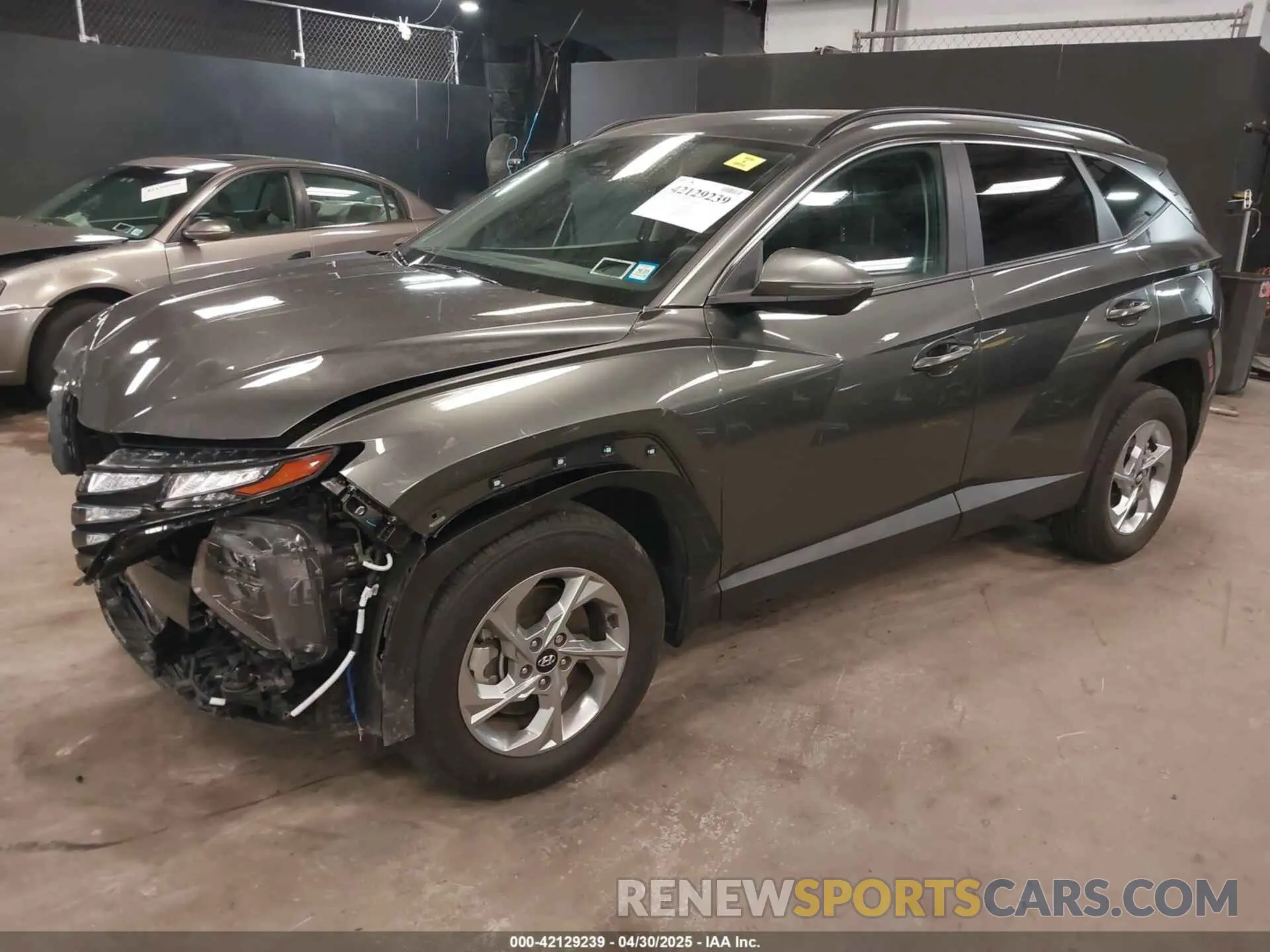 2 fotografías del automóvil dañado 5NMJBCAE9PH192703 HYUNDAI TUCSON 2023