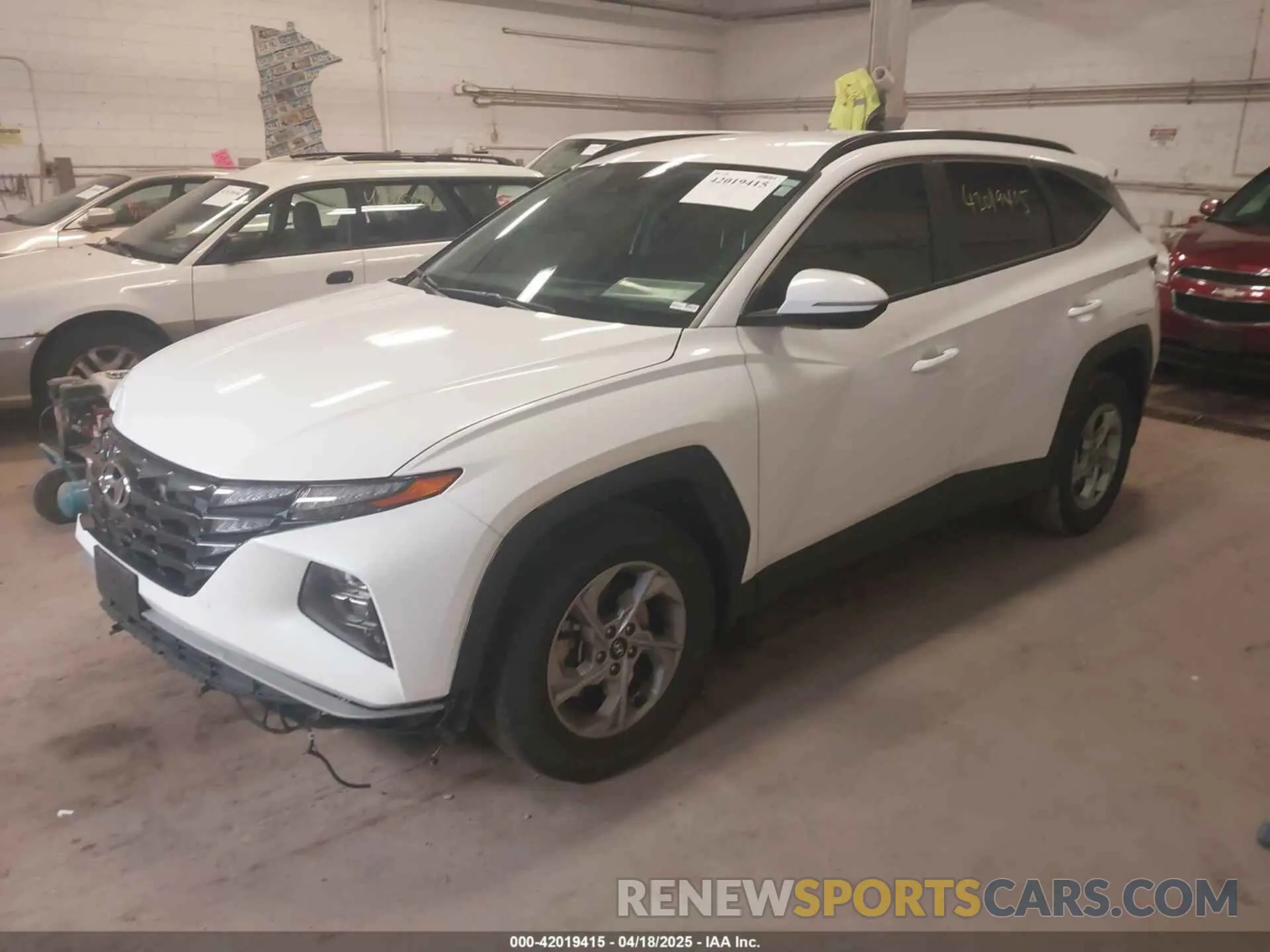2 fotografías del automóvil dañado 5NMJBCAE9PH271742 HYUNDAI TUCSON 2023