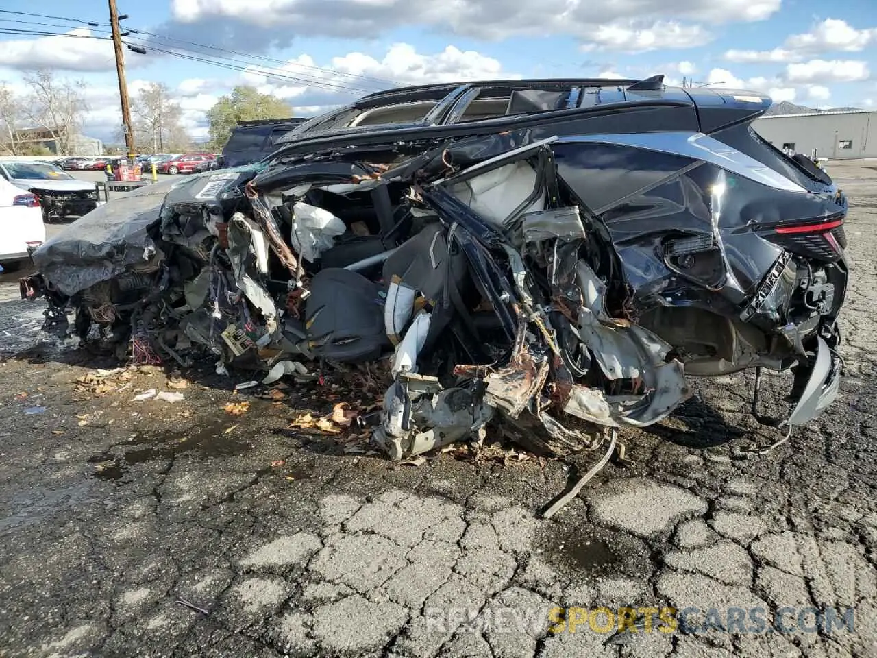 2 fotografías del automóvil dañado 5NMJE3AE5PH235313 HYUNDAI TUCSON 2023