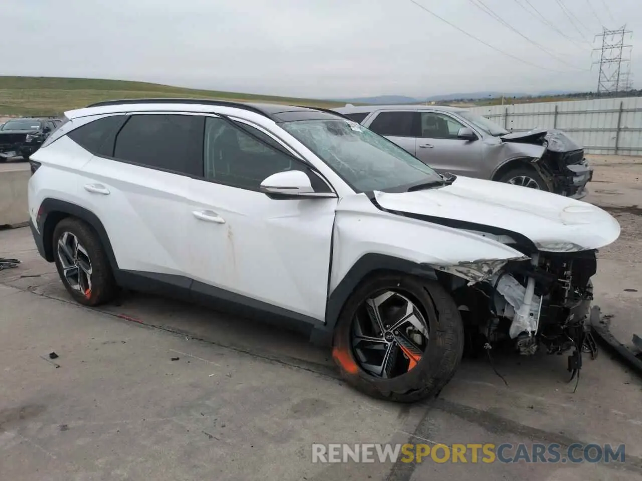 4 fotografías del automóvil dañado 5NMJE3AE7PH264649 HYUNDAI TUCSON 2023