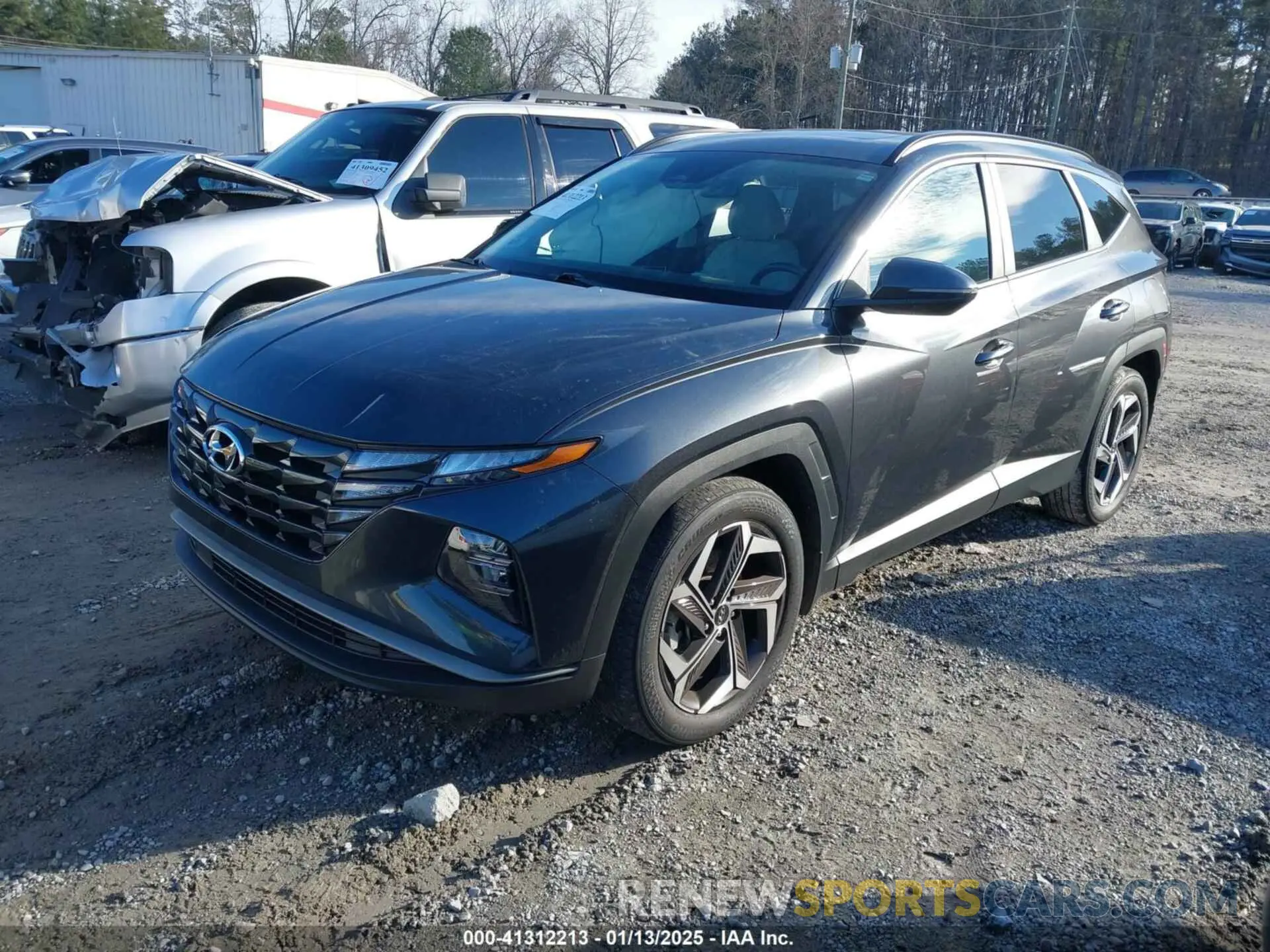 2 fotografías del automóvil dañado 5NMJF3AE4PH279512 HYUNDAI TUCSON 2023