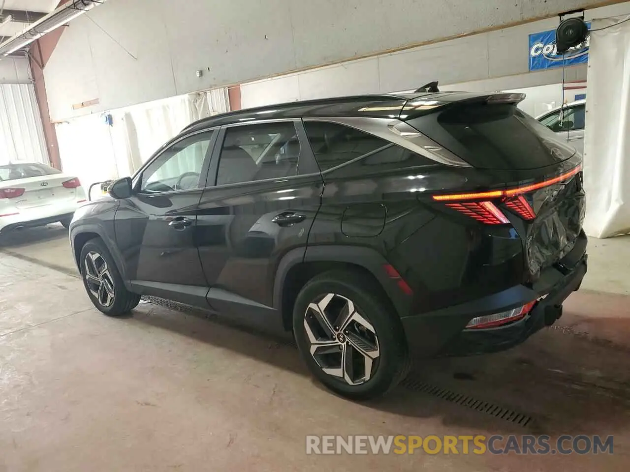 2 fotografías del automóvil dañado 5NMJFCAE5PH167575 HYUNDAI TUCSON 2023