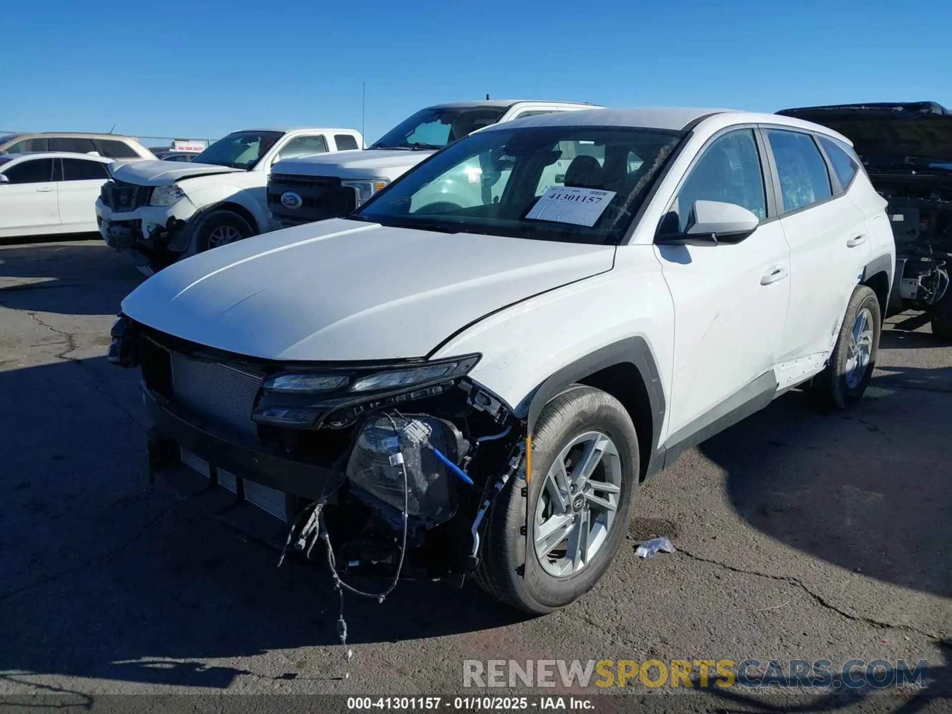 2 fotografías del automóvil dañado 5NMJA3DE4SH473556 HYUNDAI TUCSON 2025