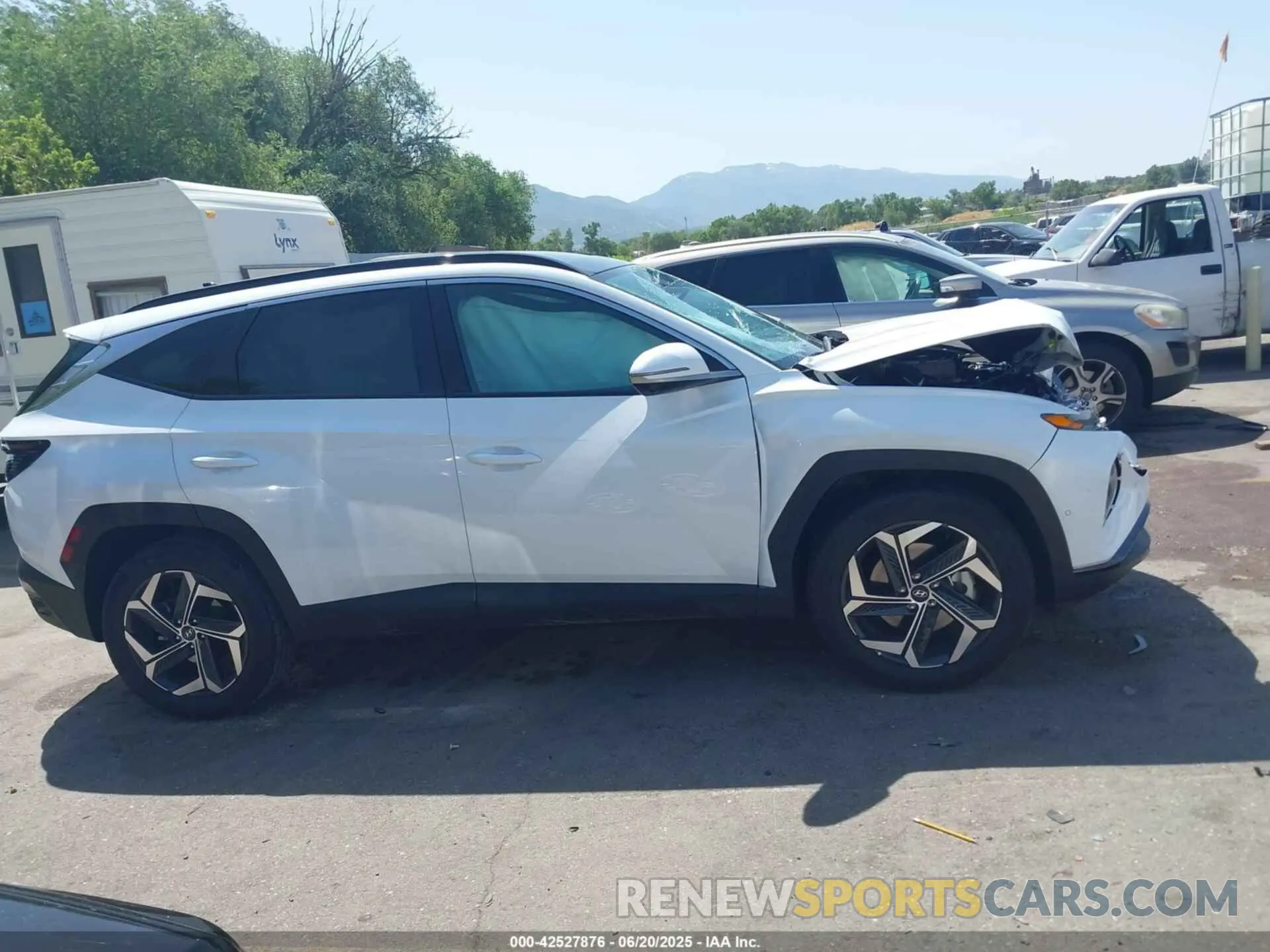 13 fotografías del automóvil dañado KM8JECD14RU234606 HYUNDAI TUCSON HYBRID 2024