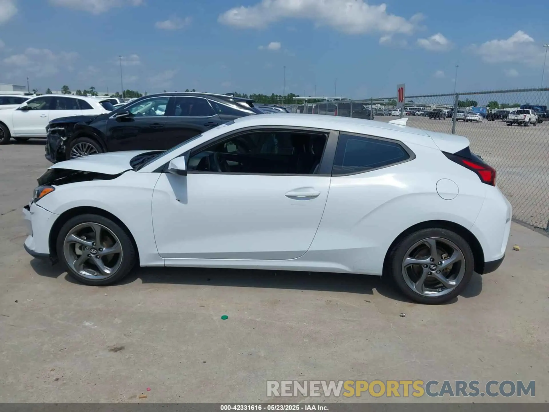 14 fotografías del automóvil dañado KMHTG6AF0LU029621 HYUNDAI VELOSTER 2020