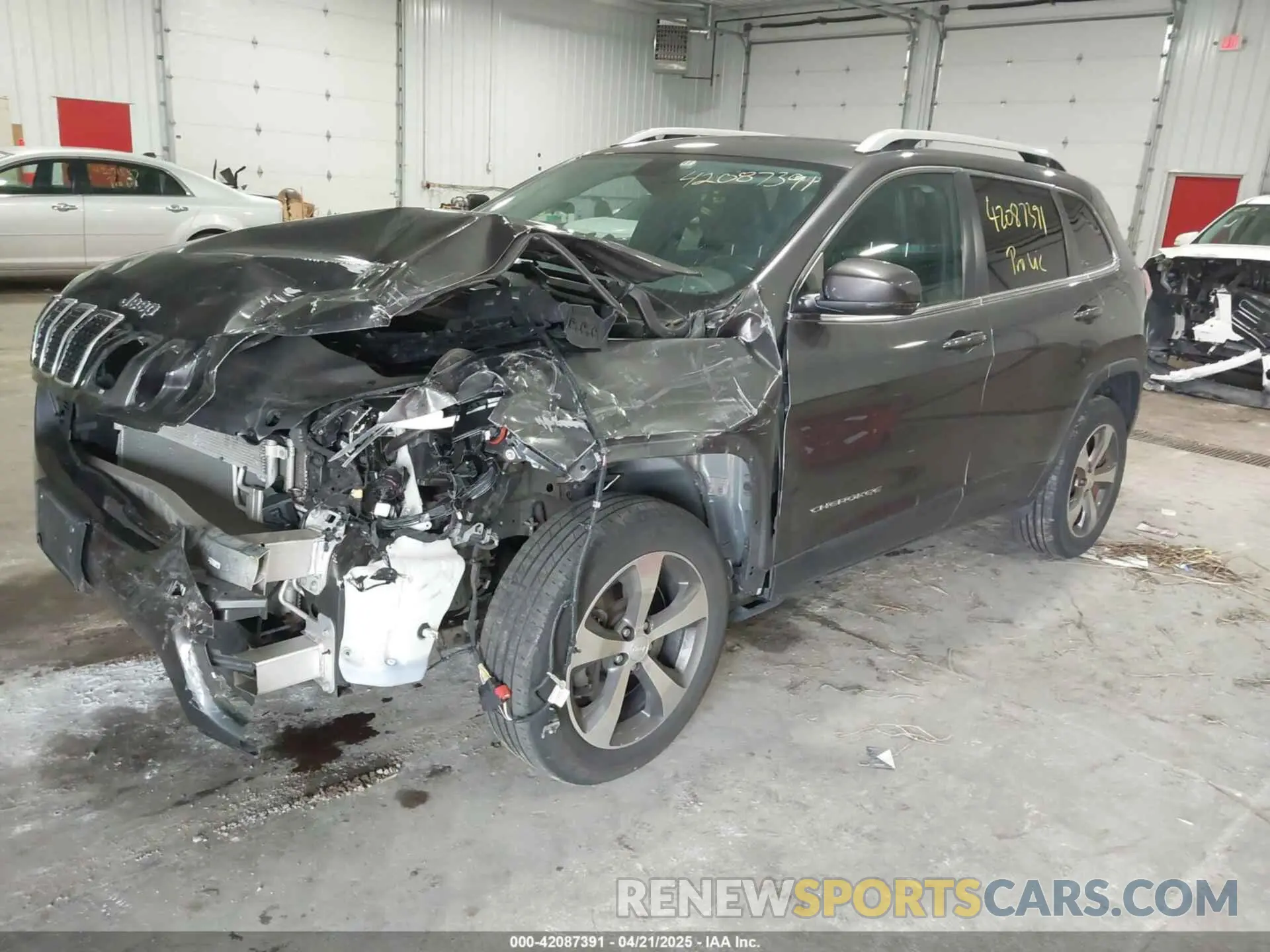 2 fotografías del automóvil dañado 1C4PJMDX2KD467412 JEEP CHEROKEE 2019