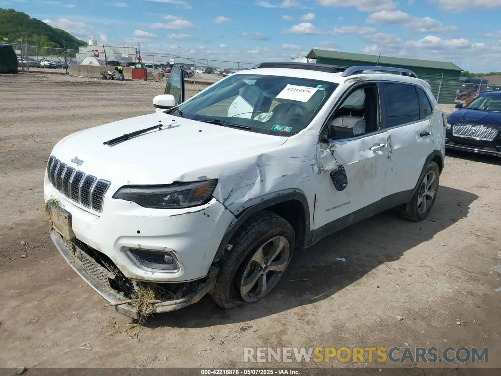 2 fotografías del automóvil dañado 1C4PJMDN9MD126798 JEEP CHEROKEE 2021