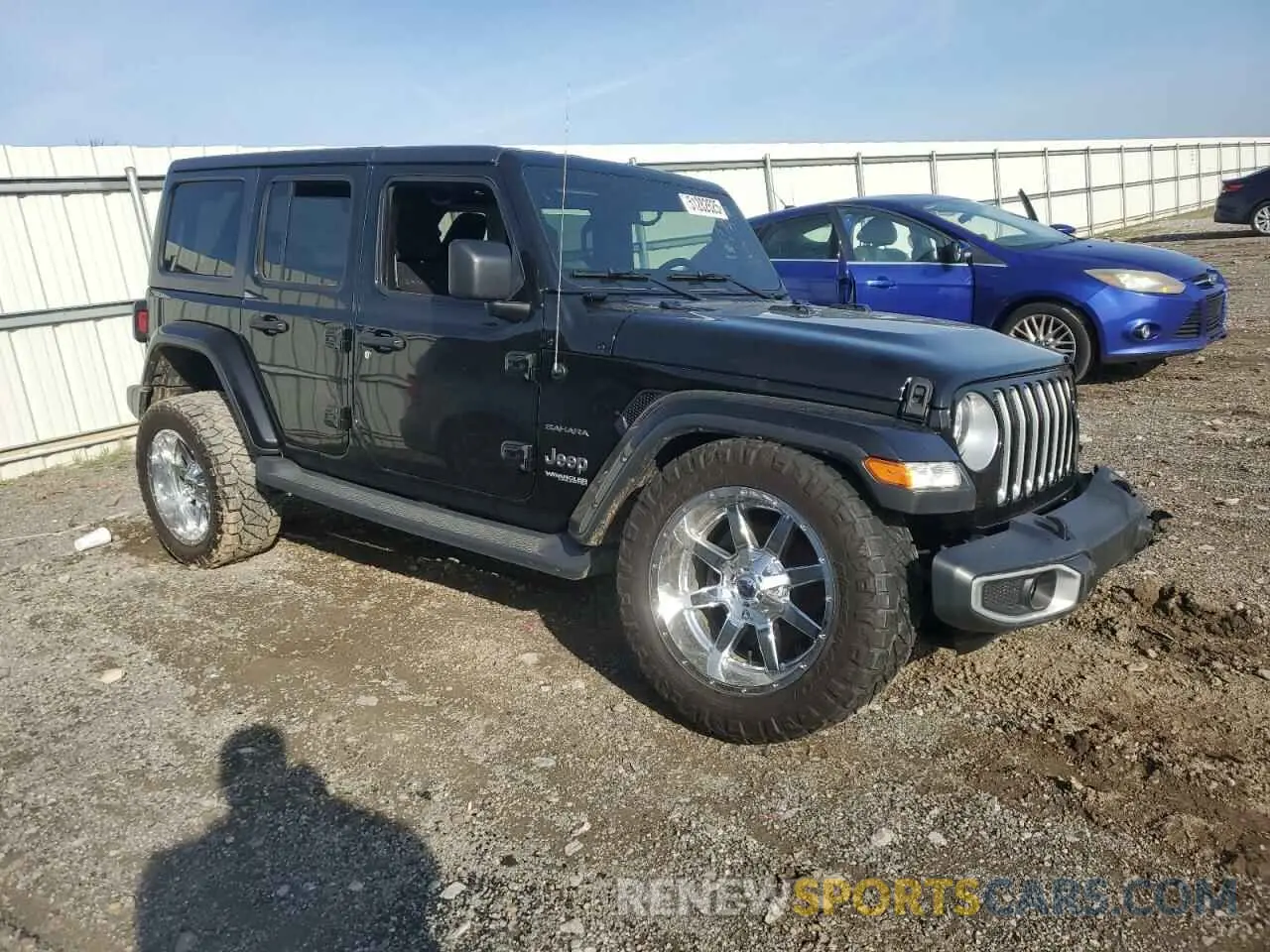 4 fotografías del automóvil dañado 1C4HJXEN3KW561998 JEEP WRANGLER 2019