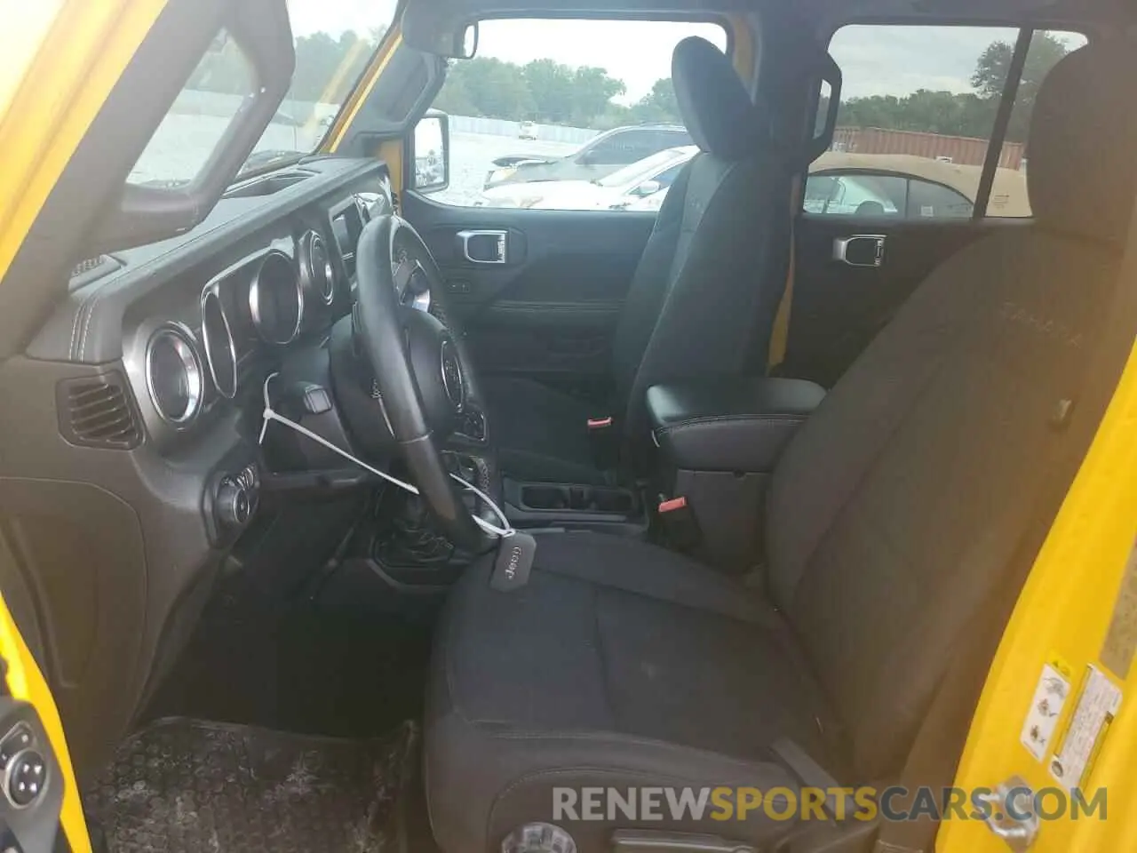 7 fotografías del automóvil dañado 1C4HJXEN4KW593715 JEEP WRANGLER 2019