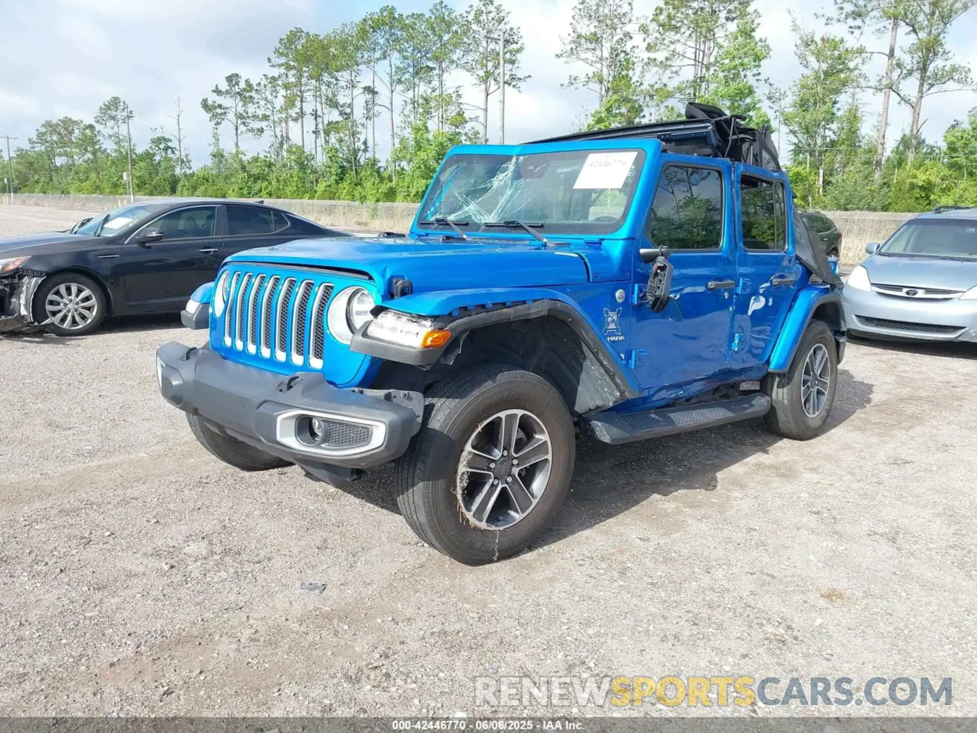 2 fotografías del automóvil dañado 1C4HJXEN6PW686565 JEEP WRANGLER 2023