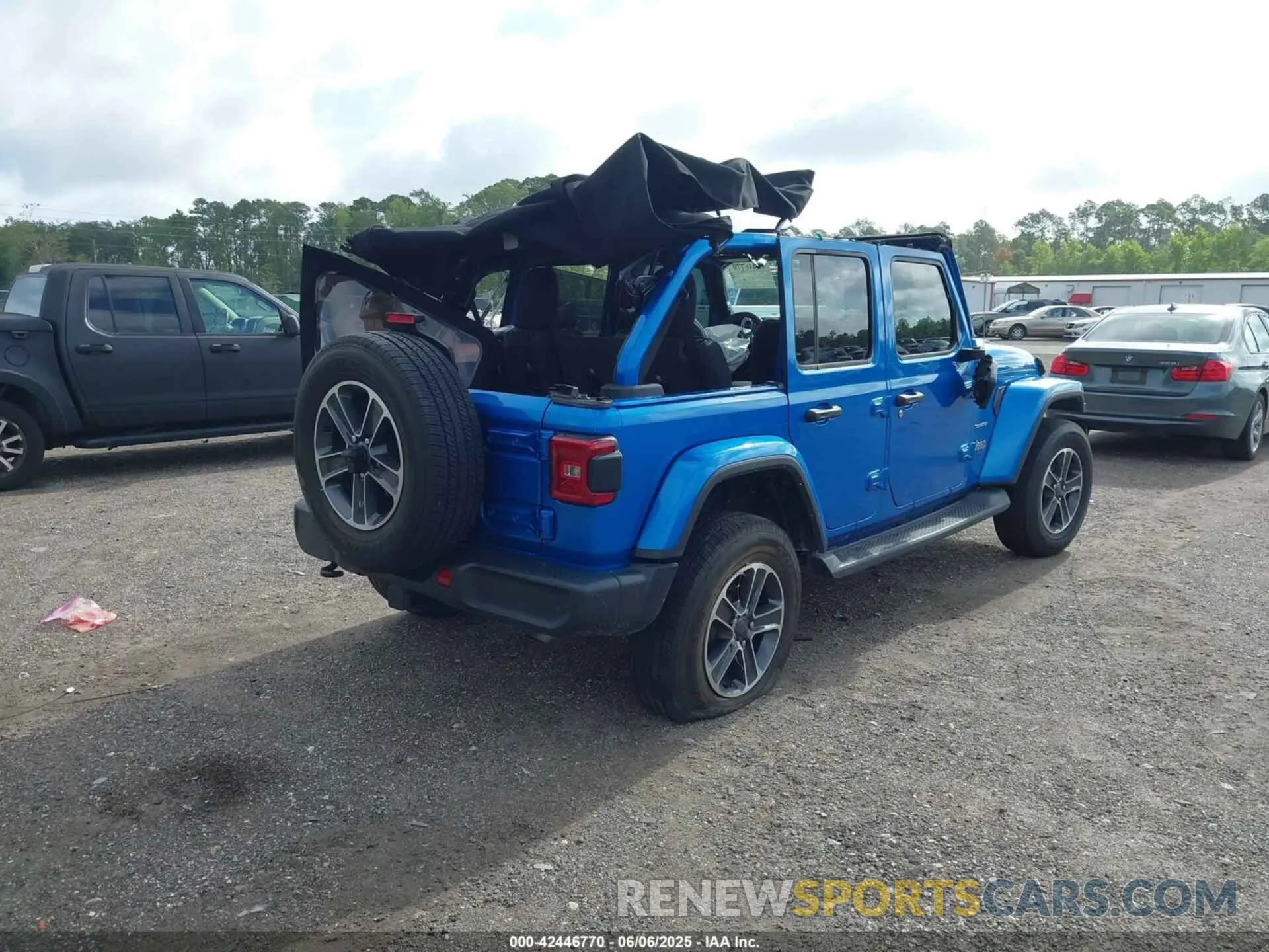 4 fotografías del automóvil dañado 1C4HJXEN6PW686565 JEEP WRANGLER 2023