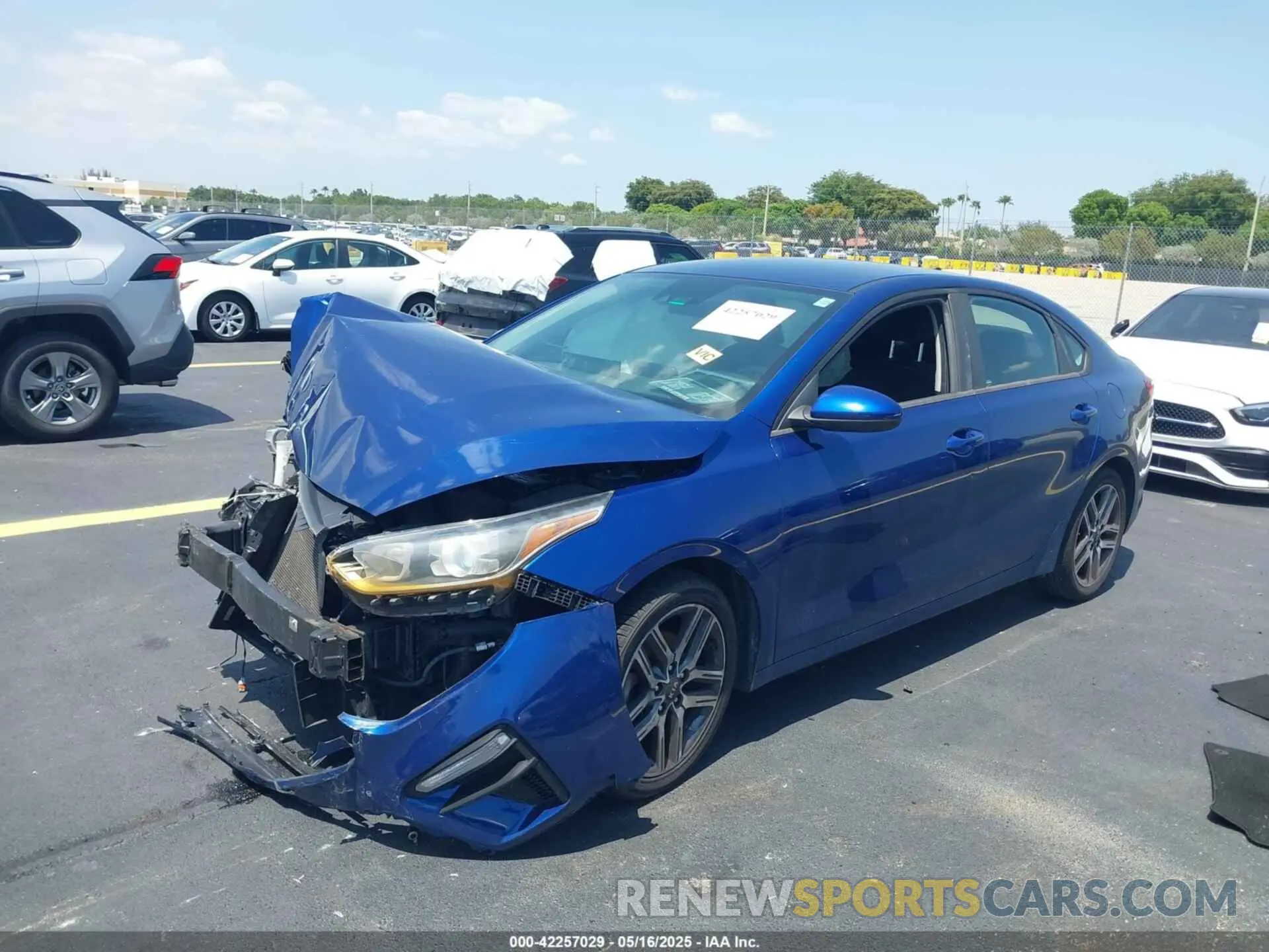2 fotografías del automóvil dañado 3KPF34AD5KE026520 KIA FORTE 2019